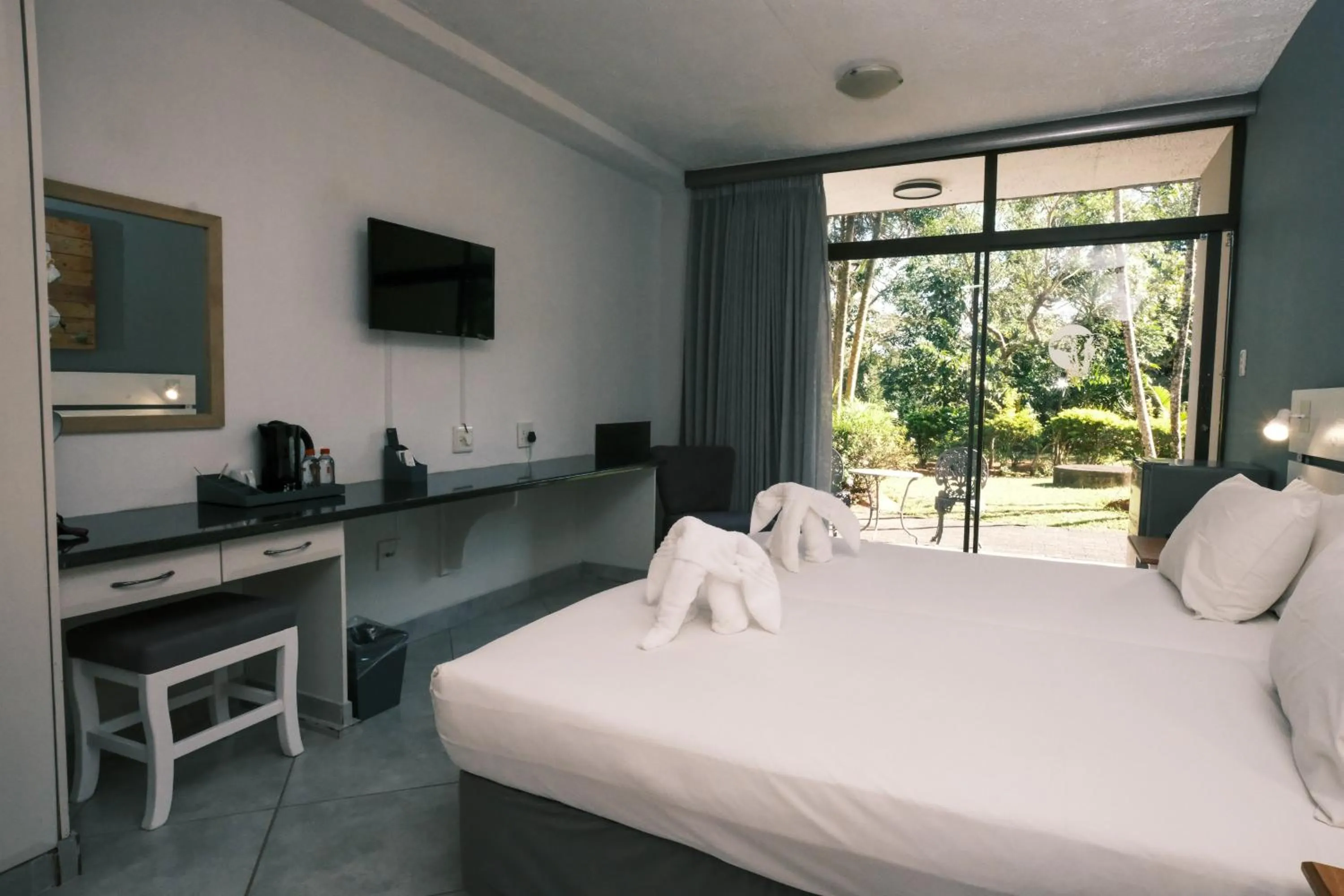 Bed in Elephant Lake Hotel