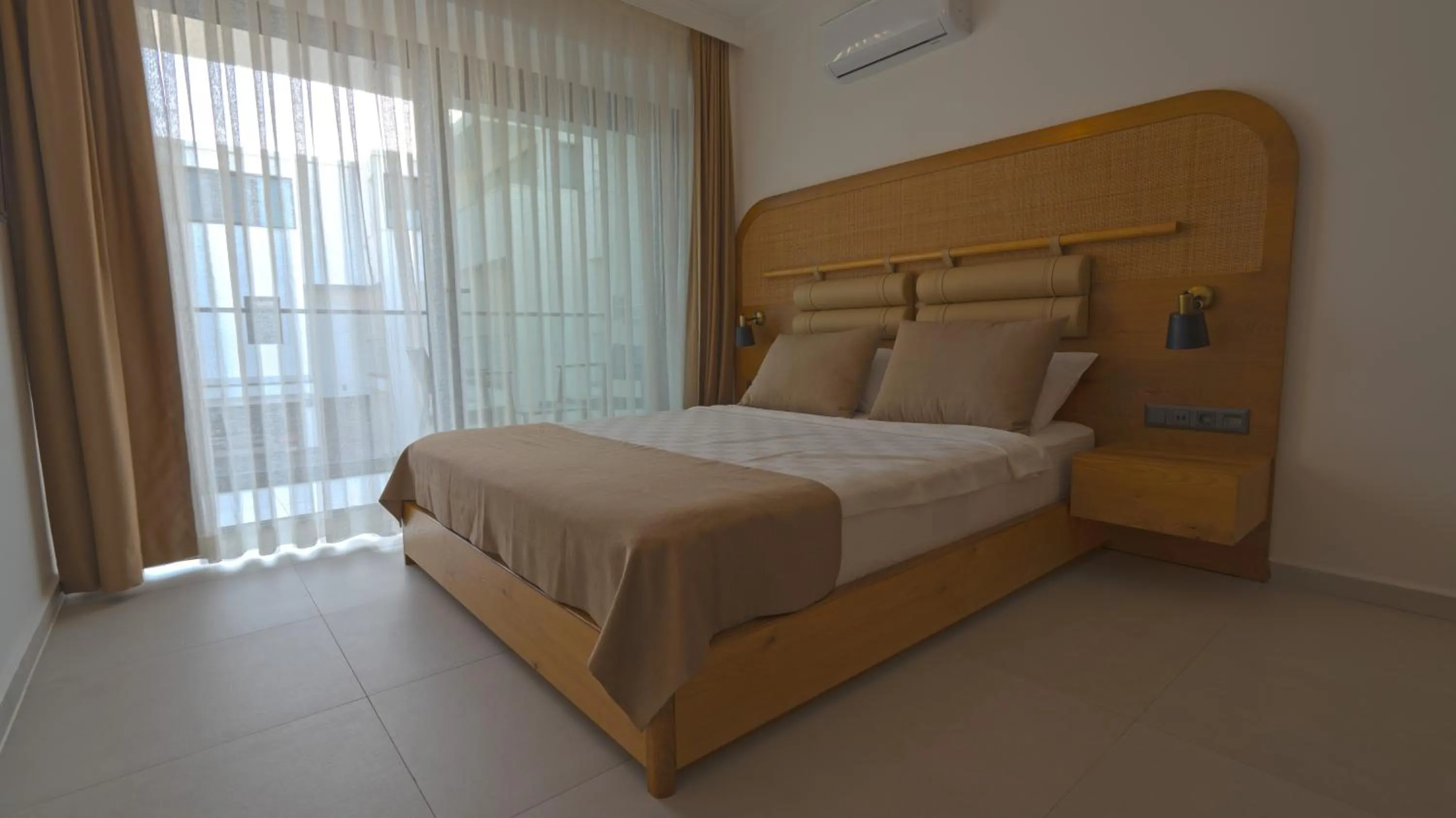 Bed in Blue Point Hotel Yalikavak
