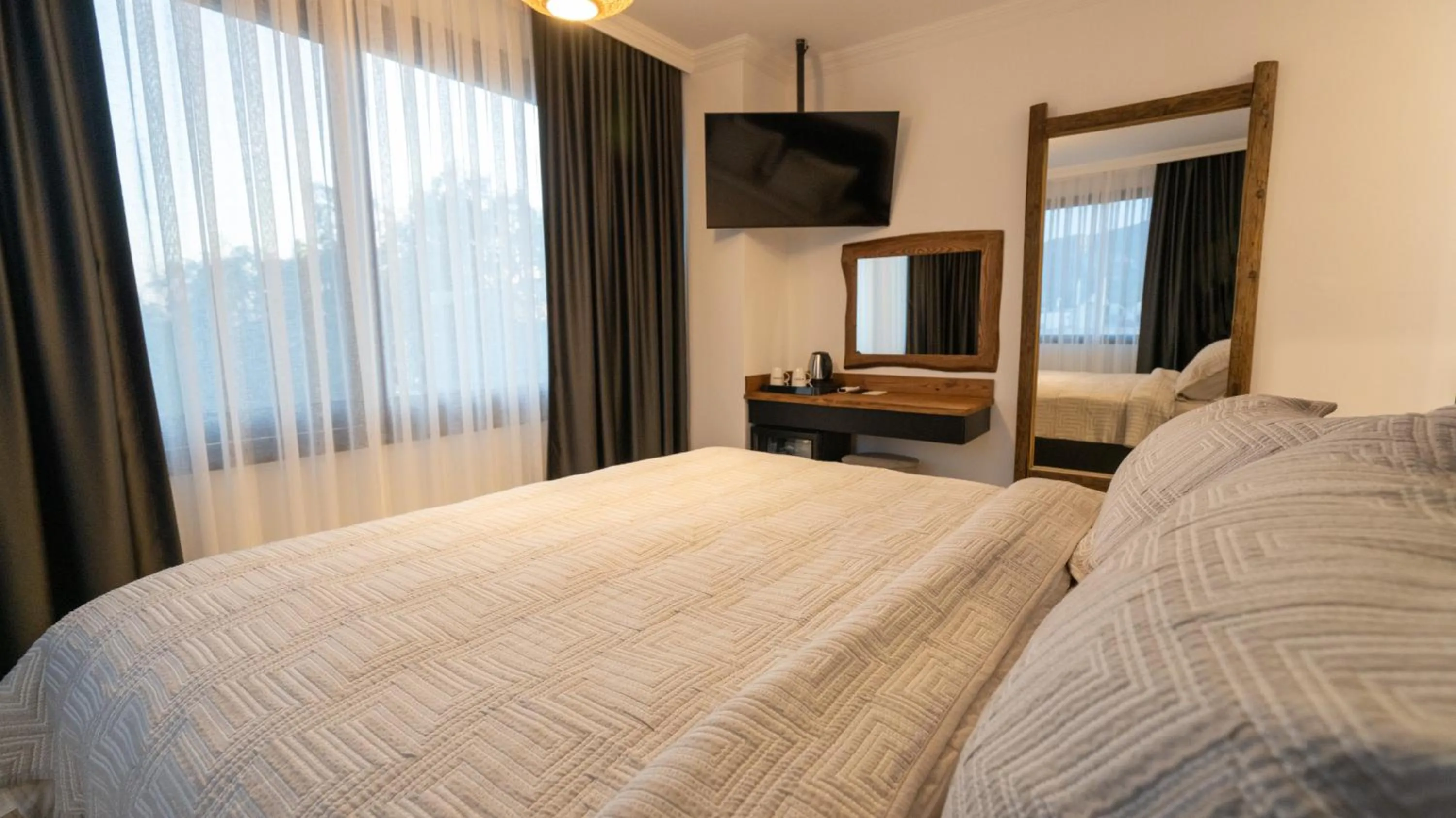 Bed in Blue Point Hotel Yalikavak