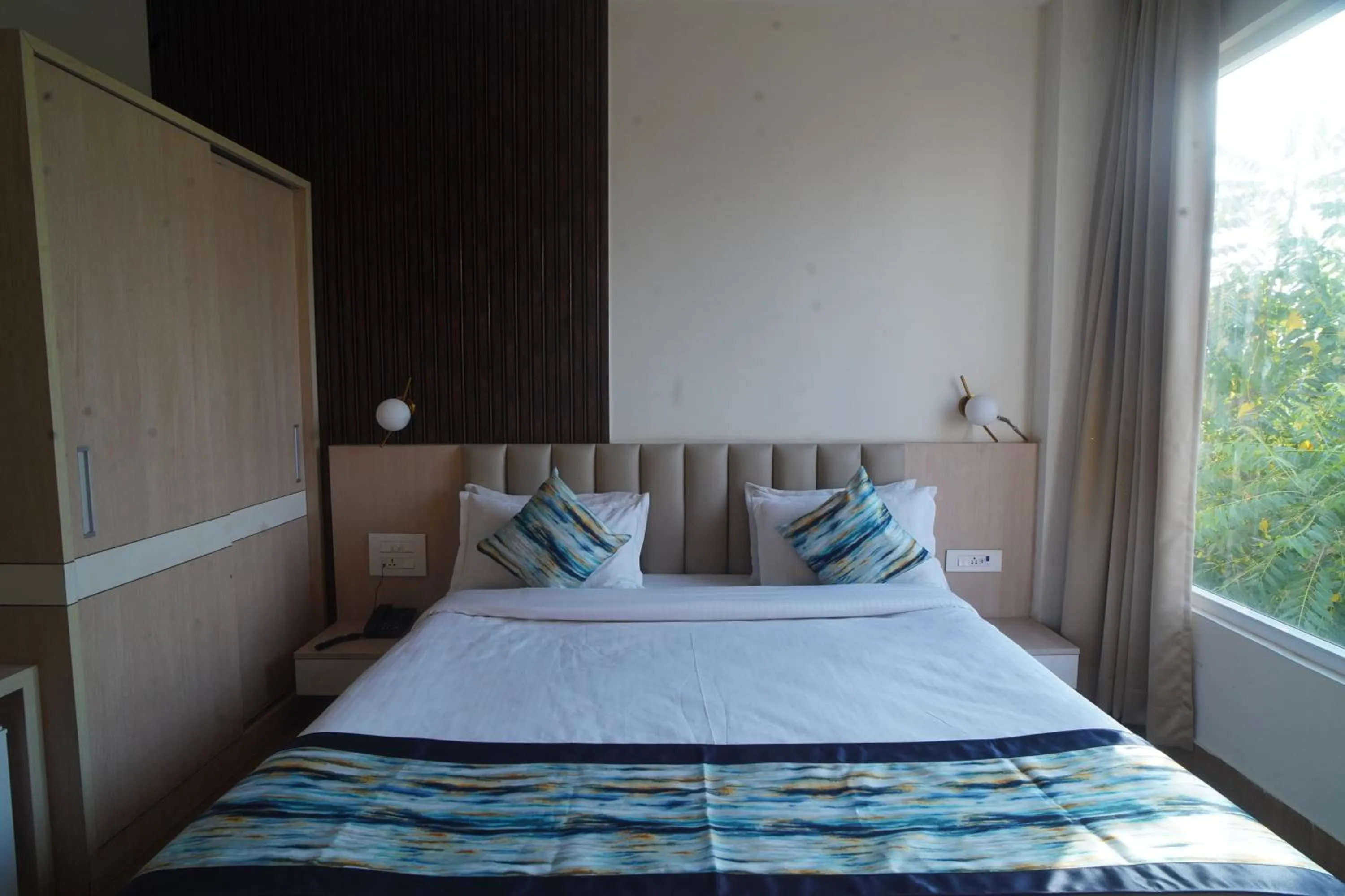 Bed in Familia Hotel and Banquets