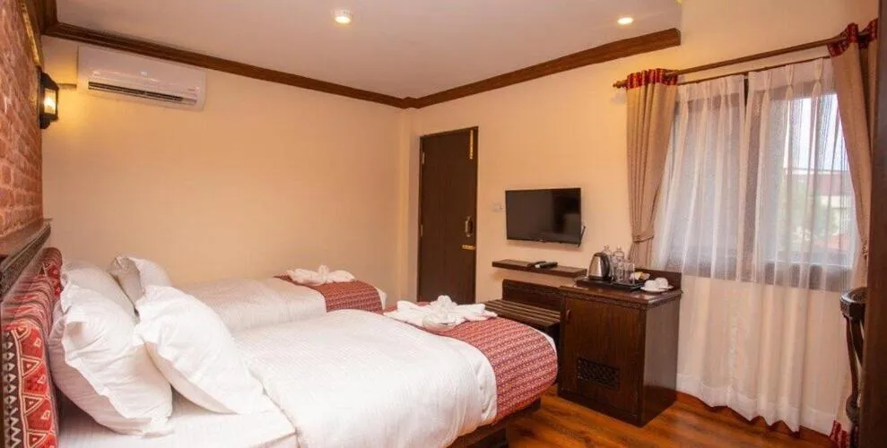 Bed in Pashupati Boutique Hotel & Spa
