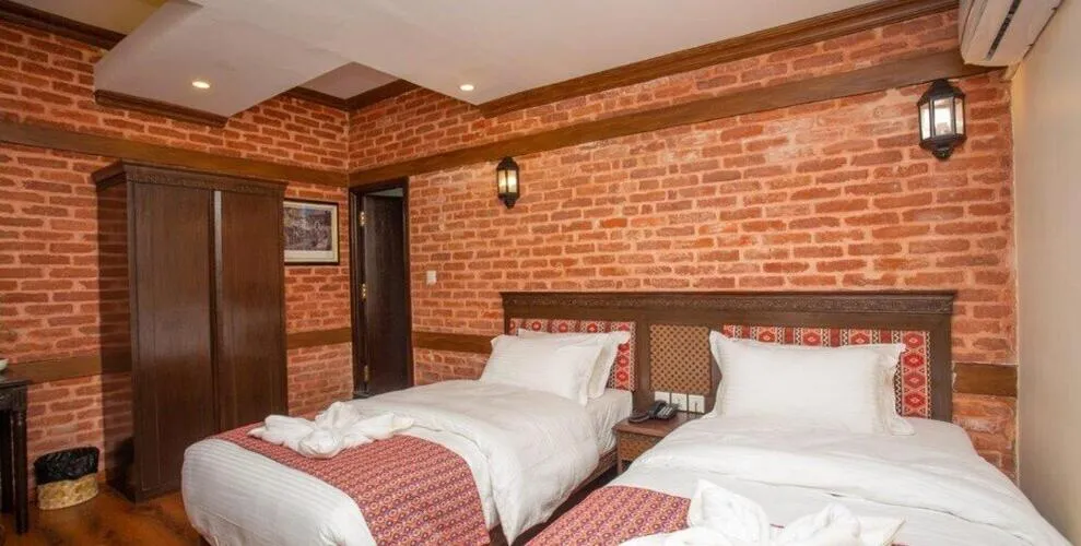 Bed in Pashupati Boutique Hotel & Spa