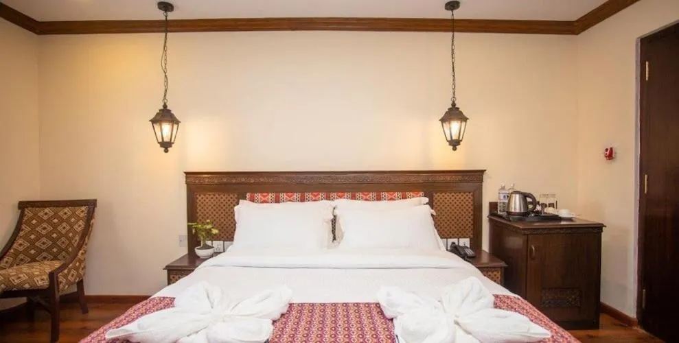 Bed in Pashupati Boutique Hotel & Spa