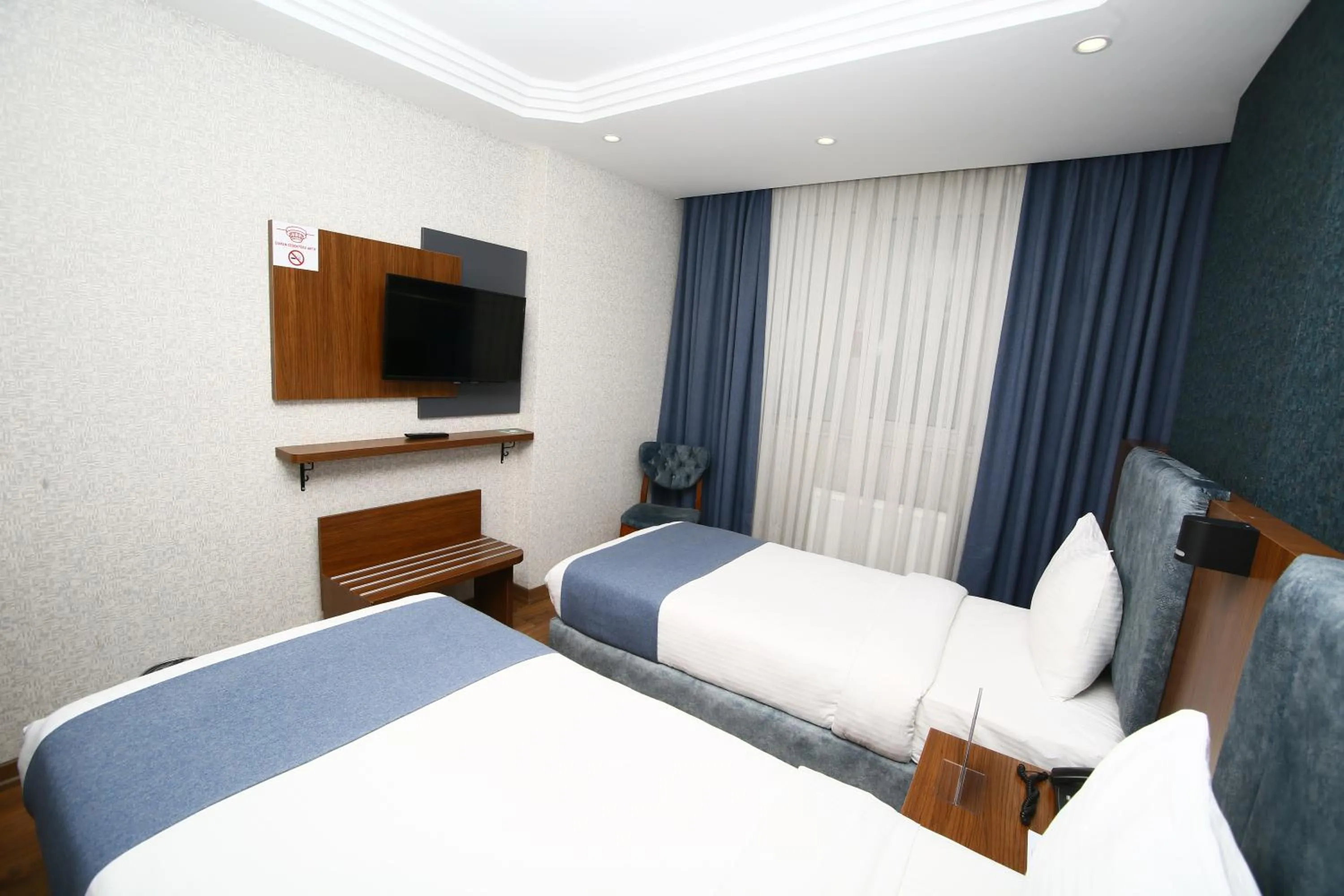 Bed in BUKAVİYYE HOTEL