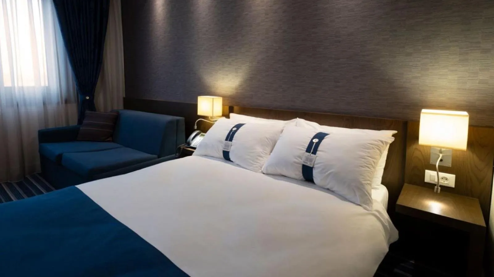 Bed in FEZ INN Hotel