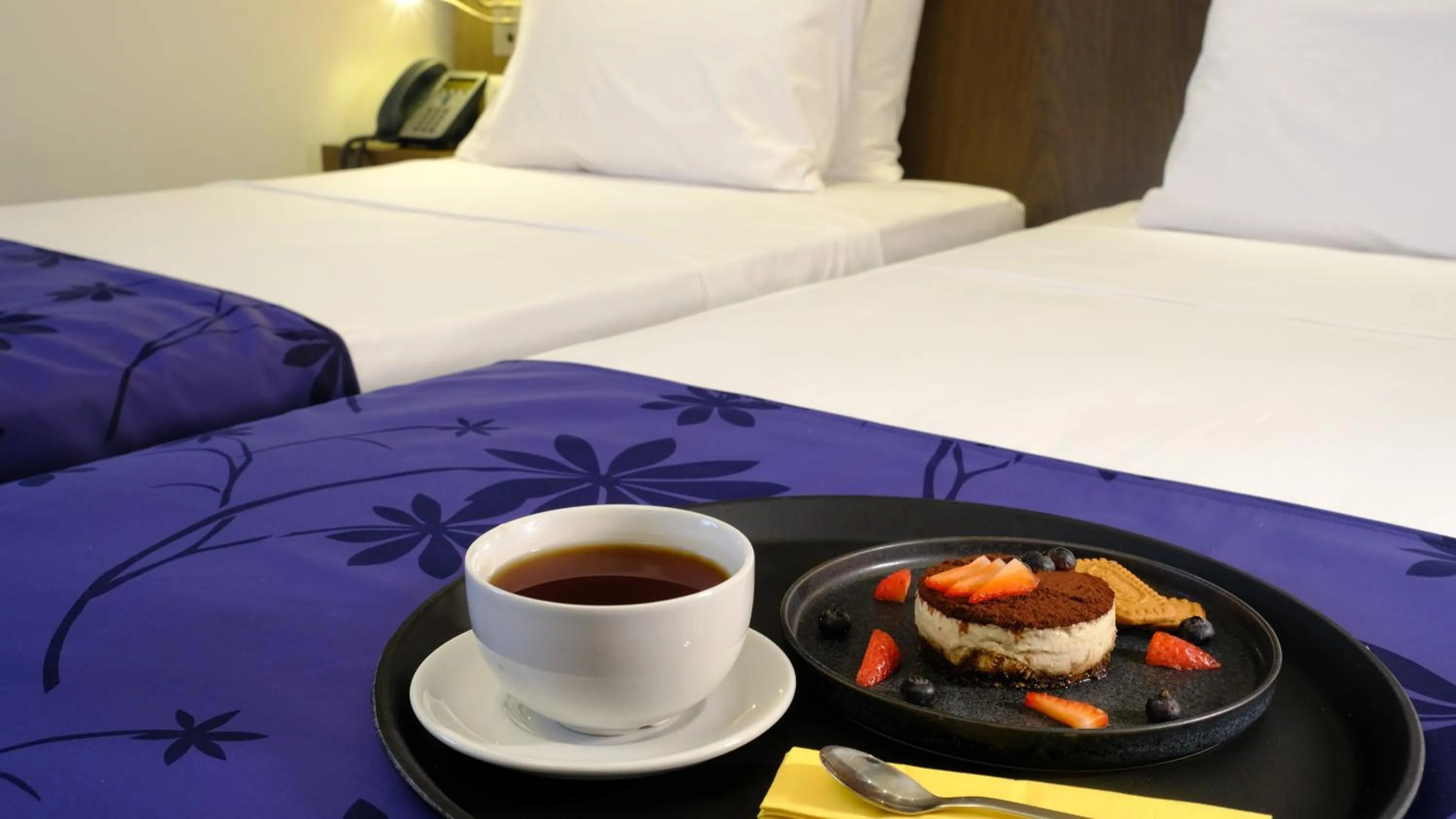 Bed in FEZ INN Hotel