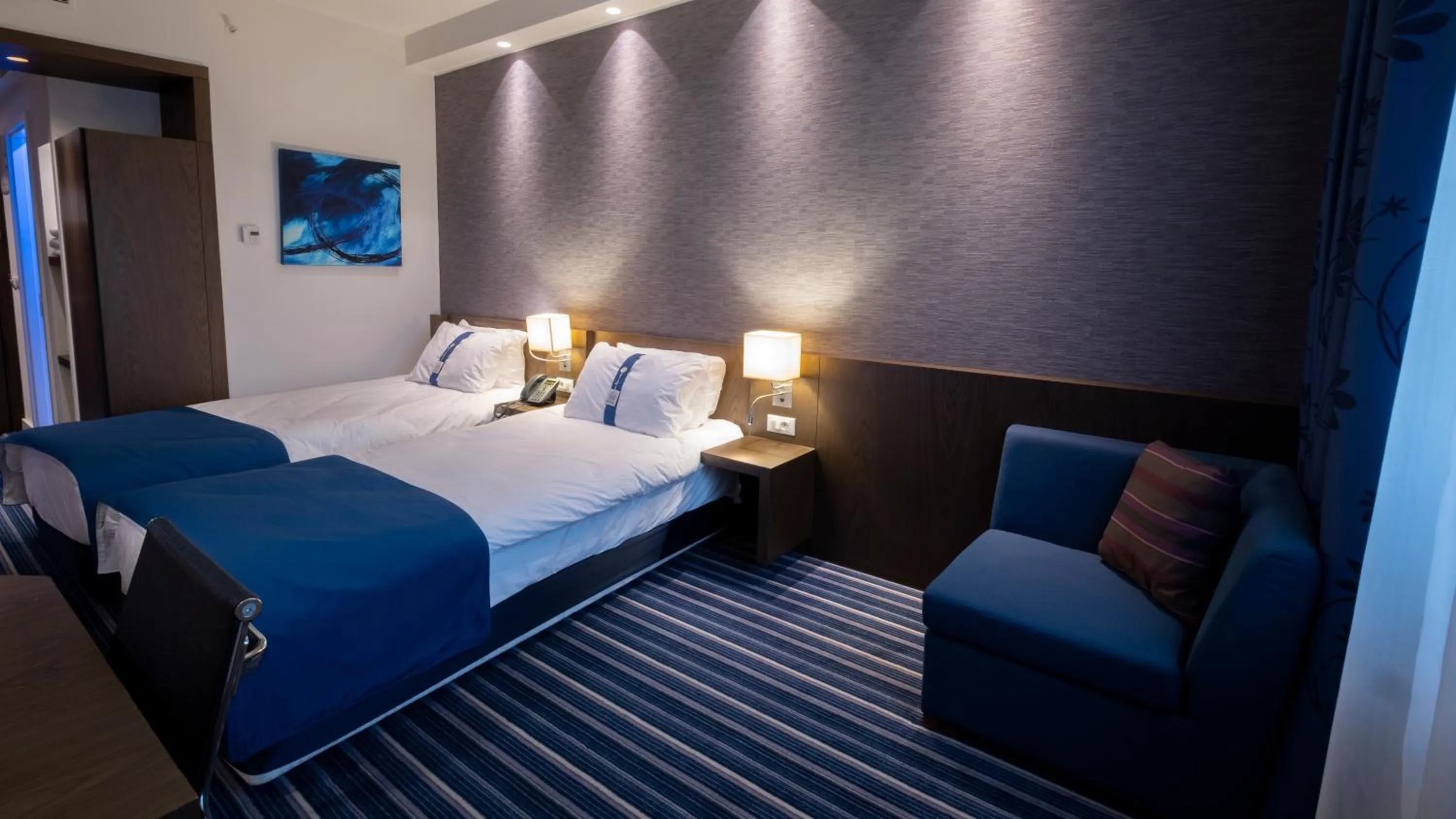 Bed in FEZ INN Hotel