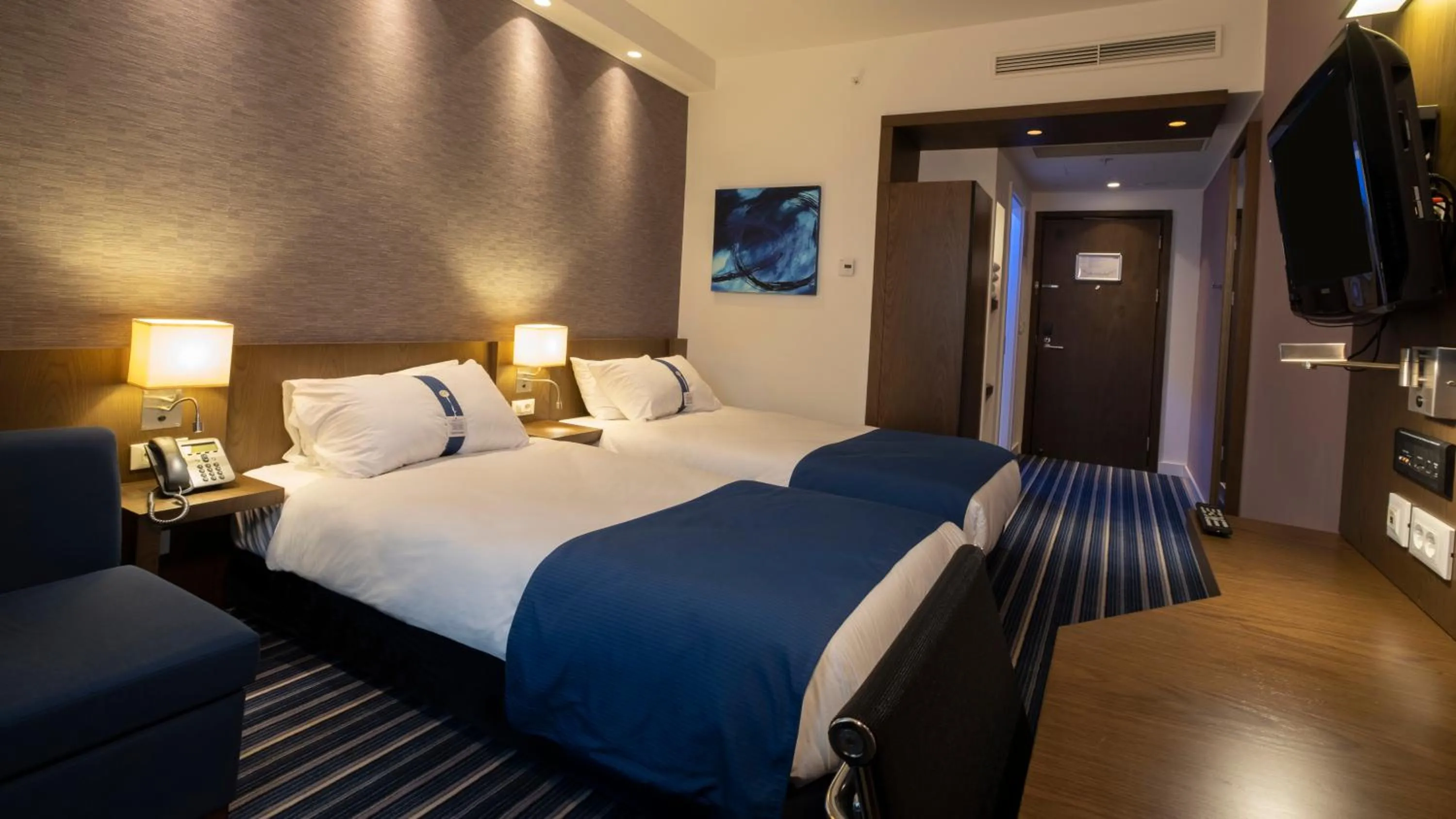 Bed in FEZ INN Hotel