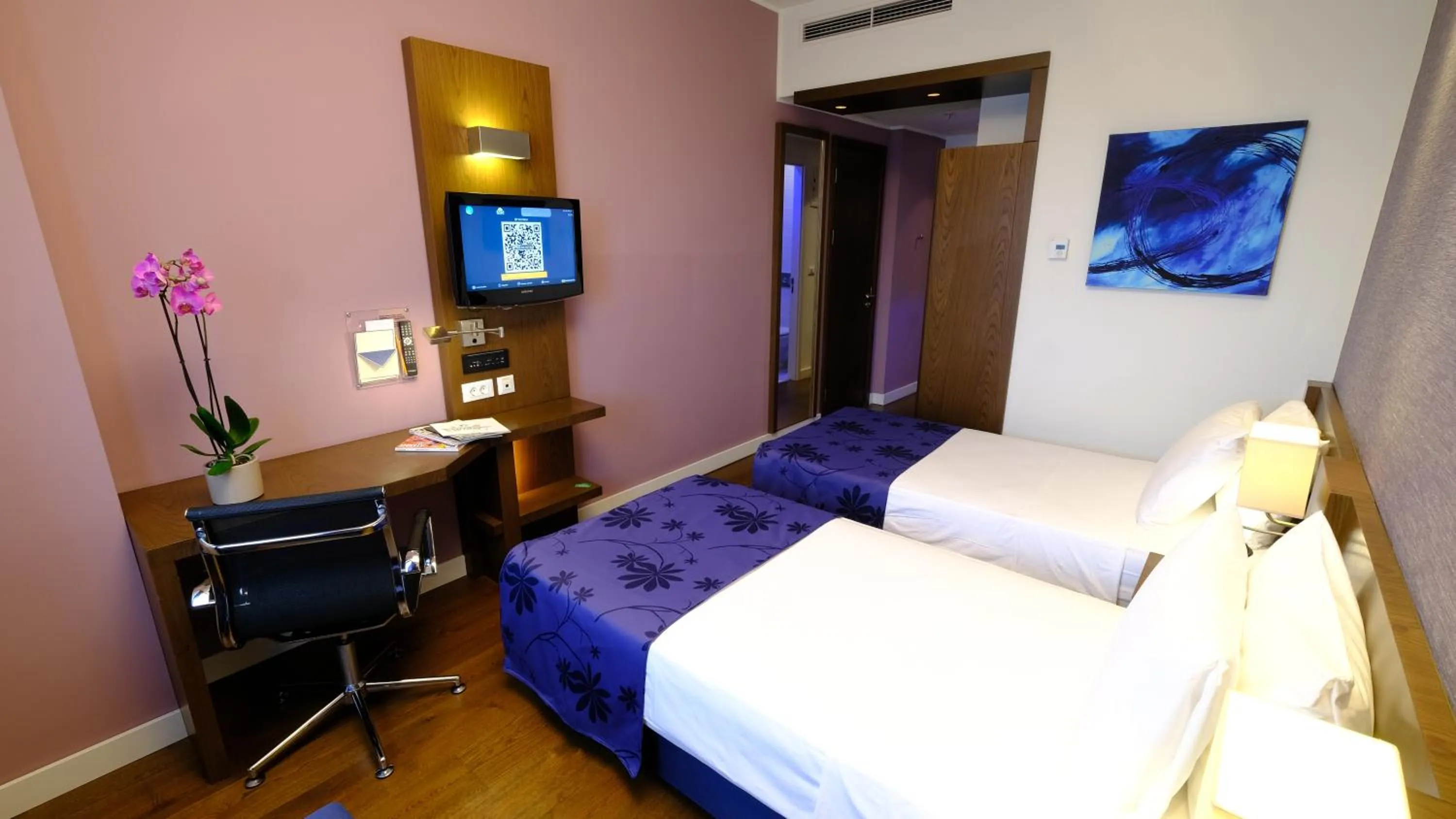 Bed in FEZ INN Hotel