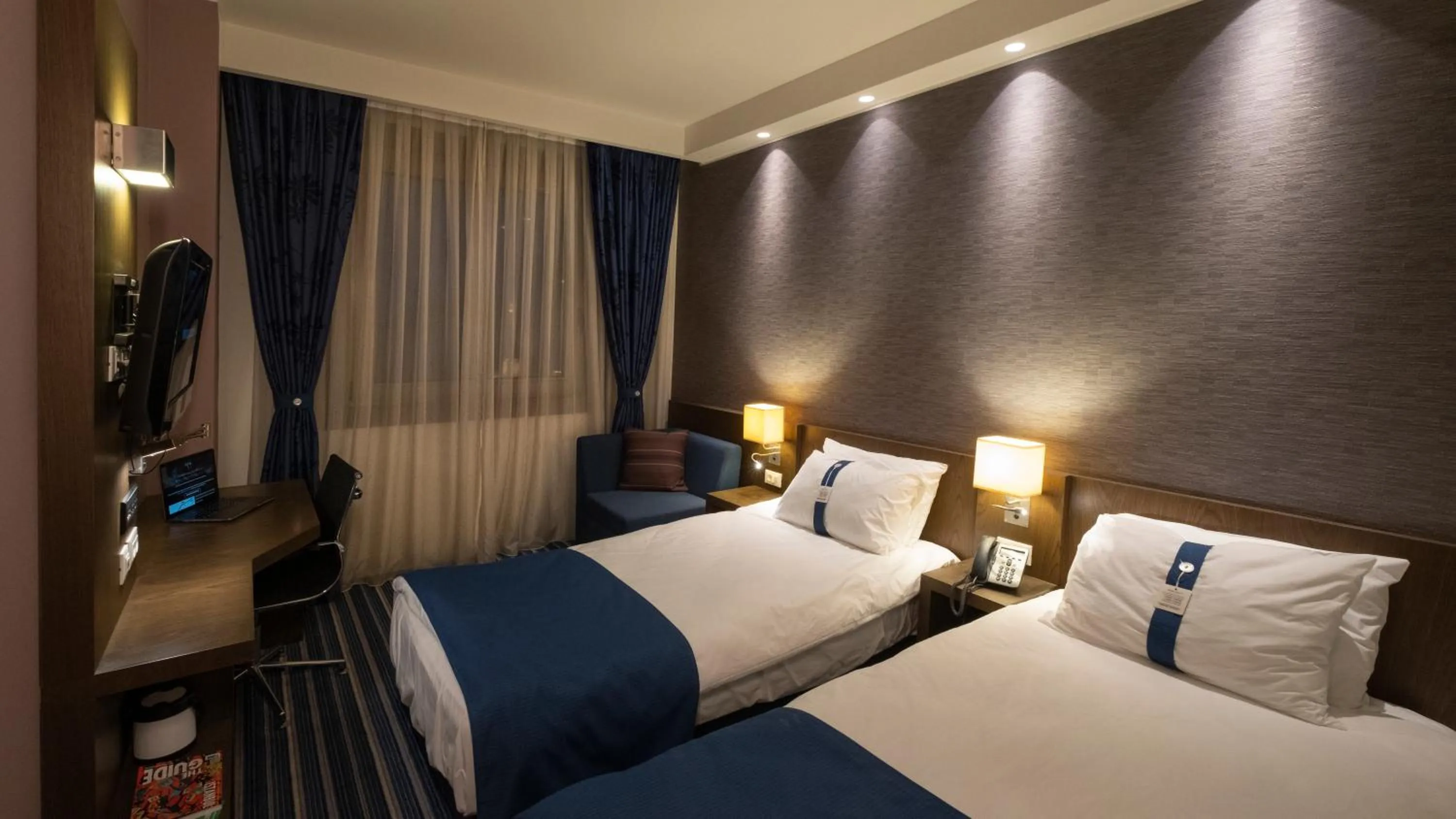 Bed in FEZ INN Hotel