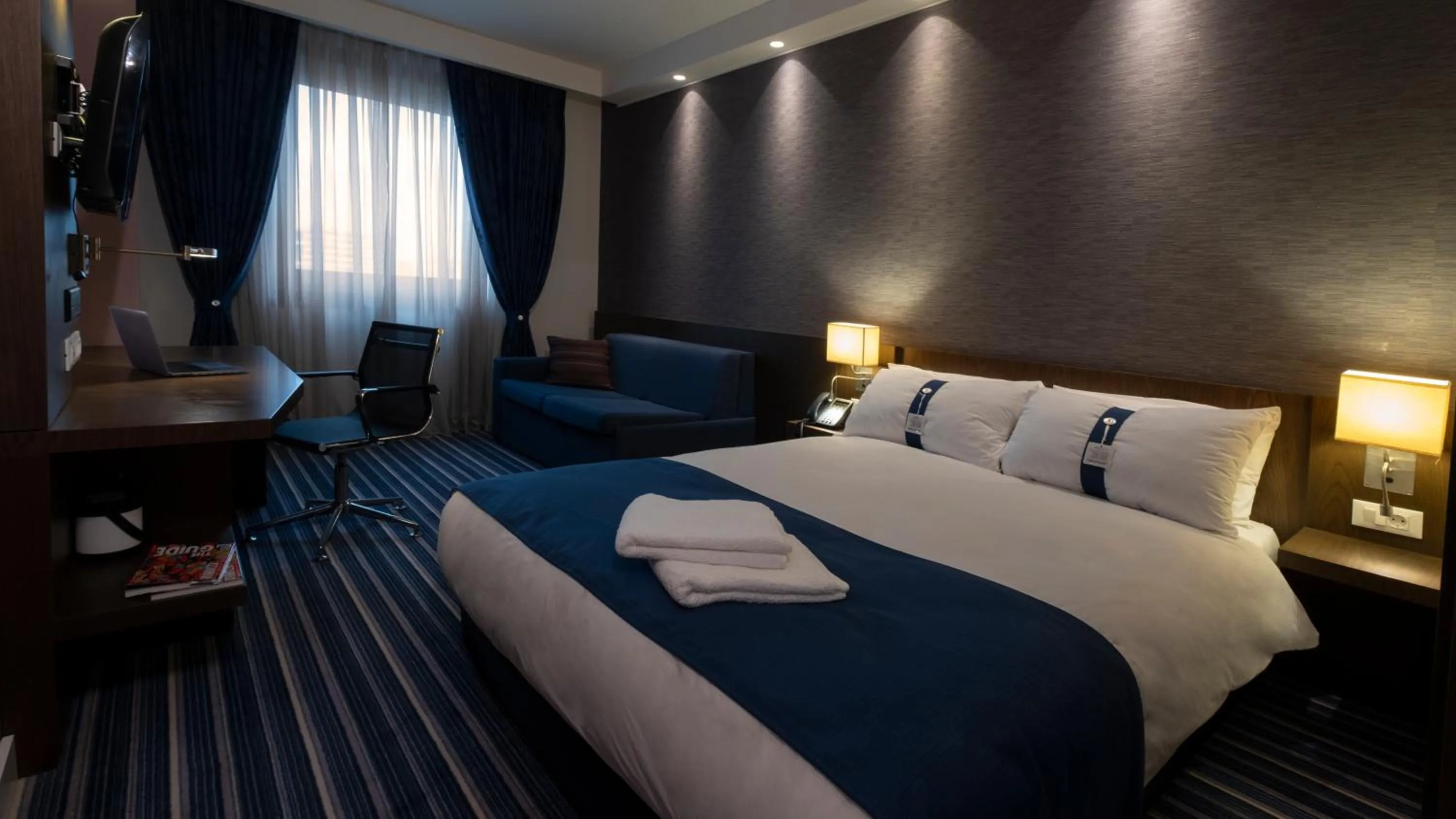 Bed in FEZ INN Hotel