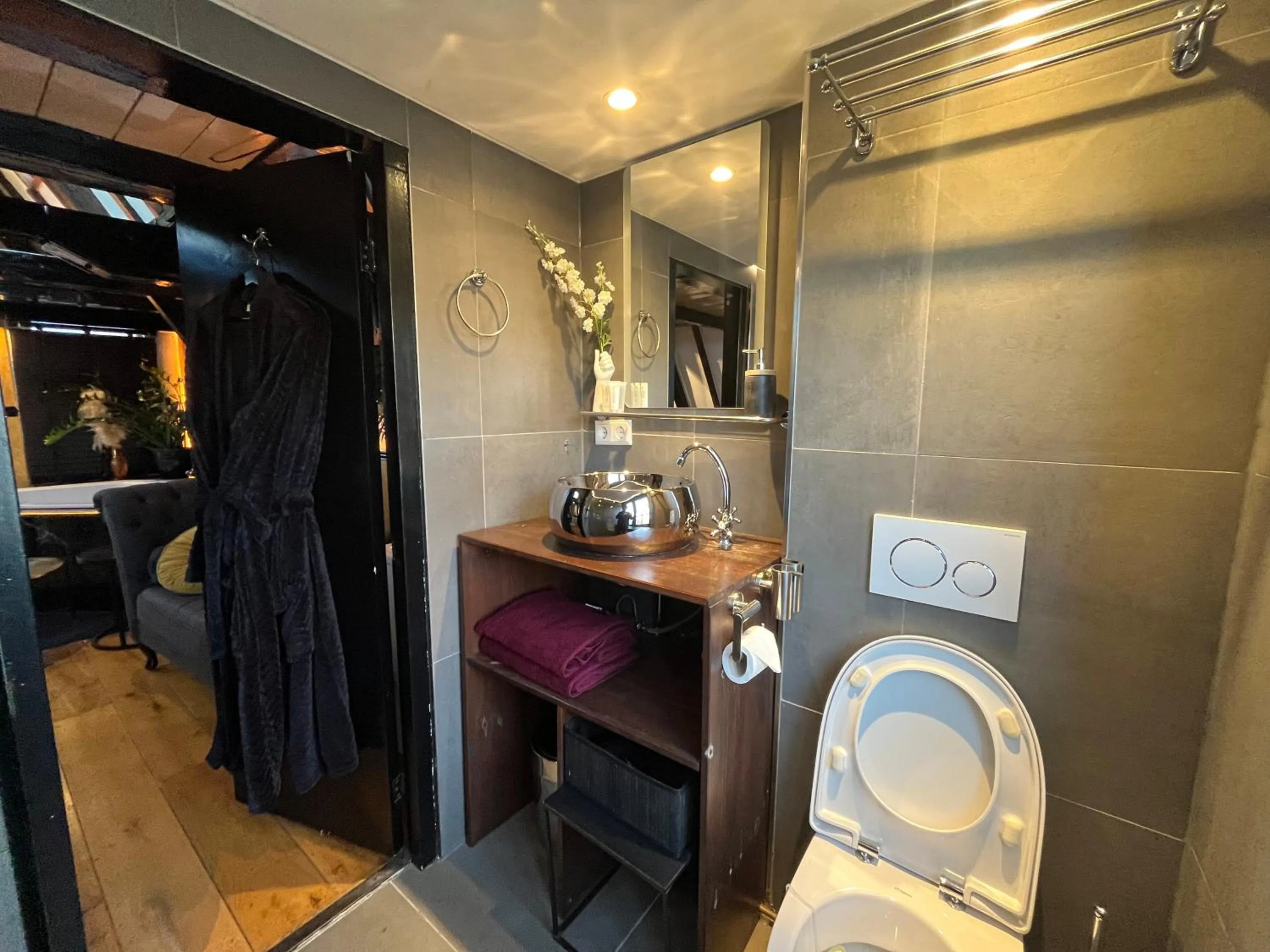 Toilet in The Enlightened House Luxury Suites