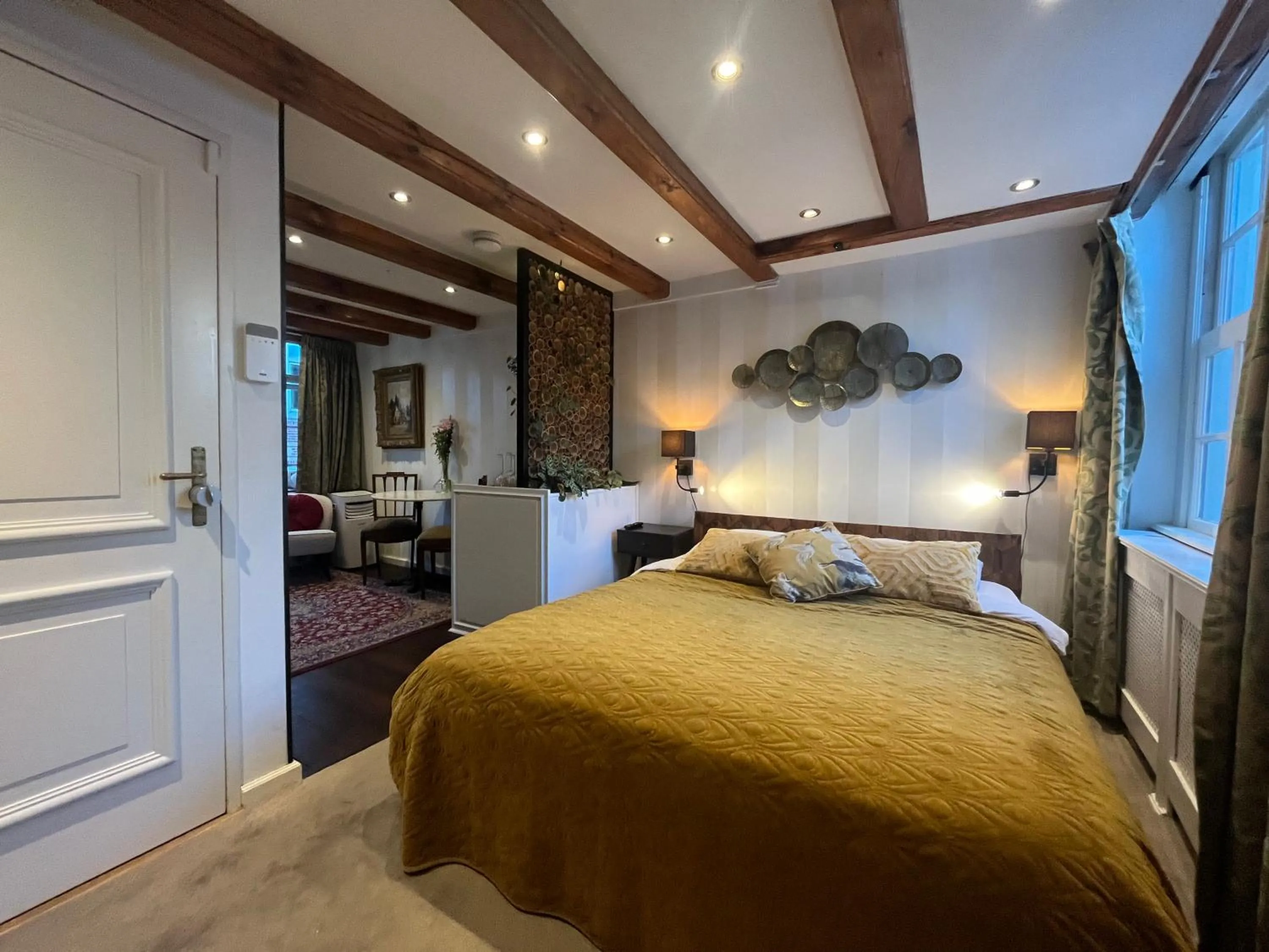 Bed in The Enlightened House Luxury Suites