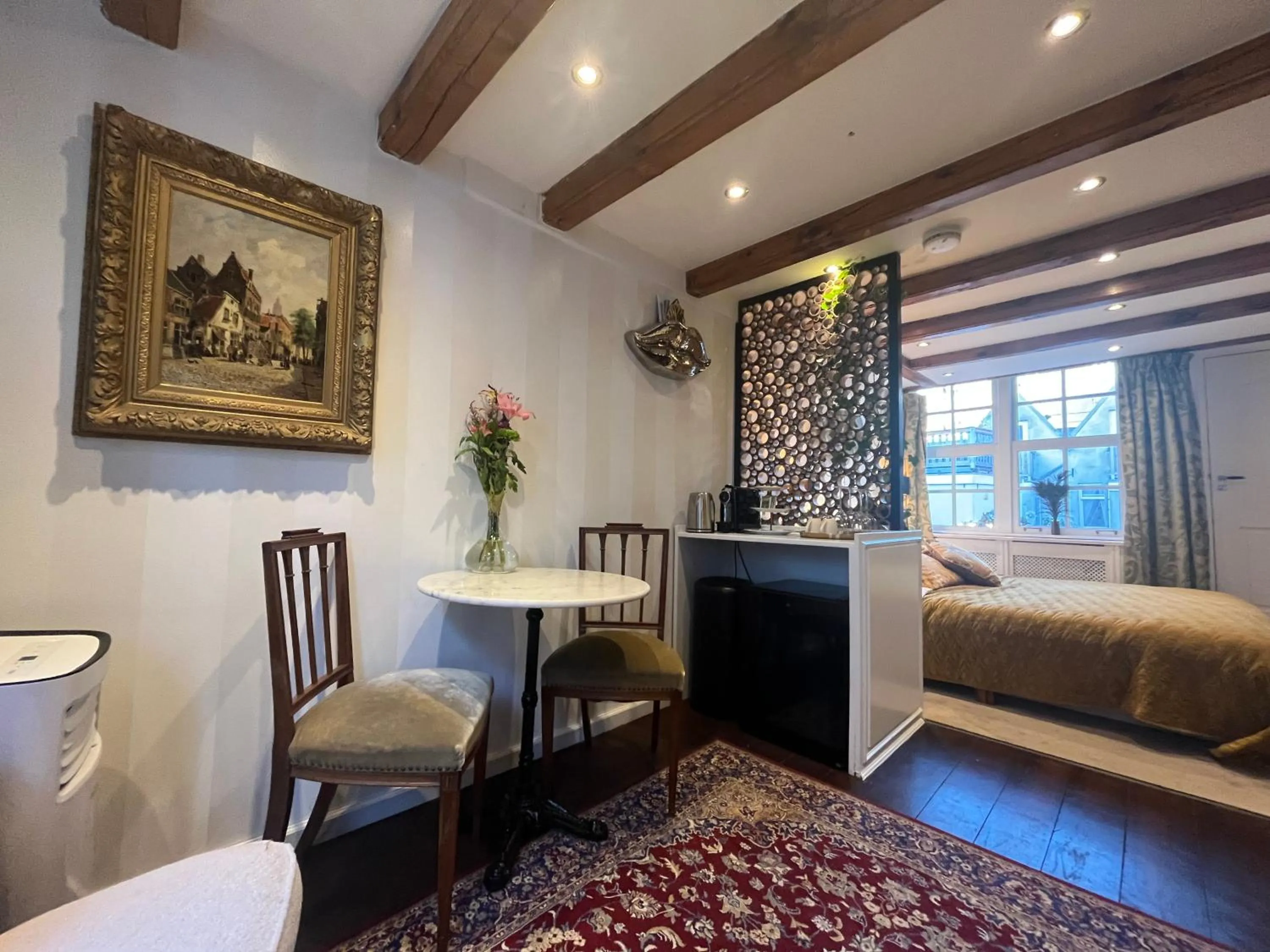 Living room, Bed in The Enlightened House Luxury Suites