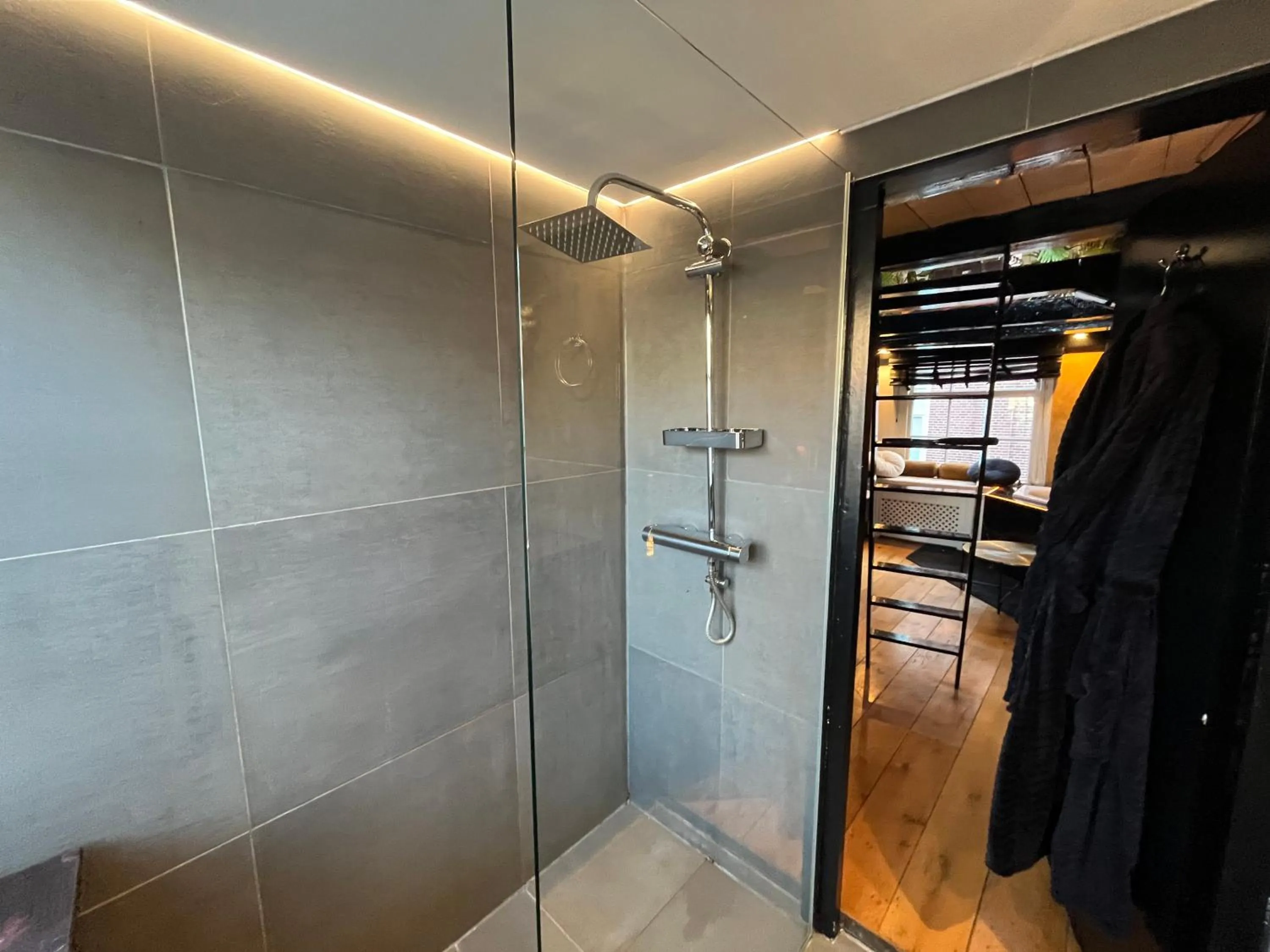 Shower in The Enlightened House Luxury Suites