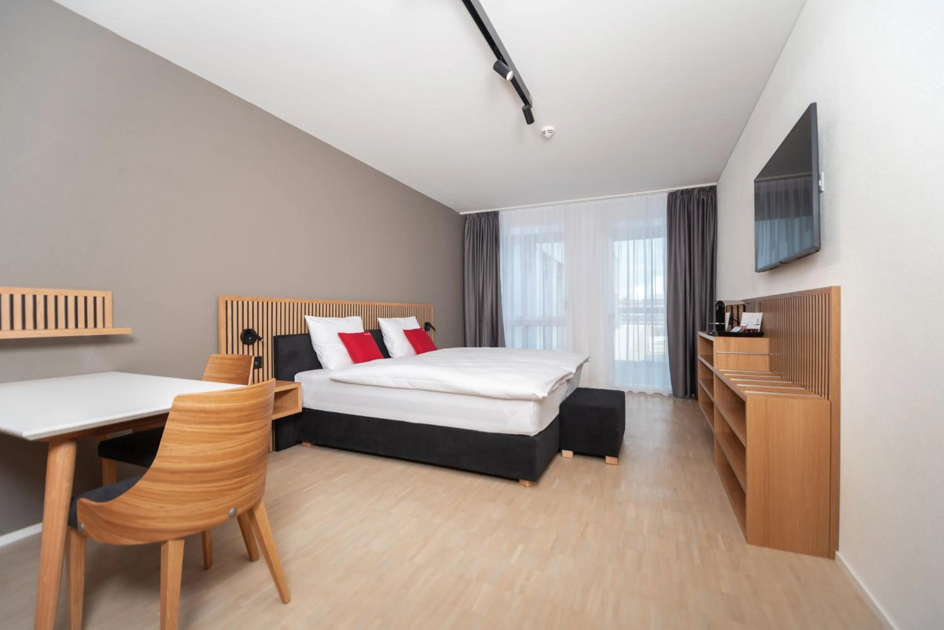 Bedroom, Bed in Tailormade Hotel BAB Bachenbülach