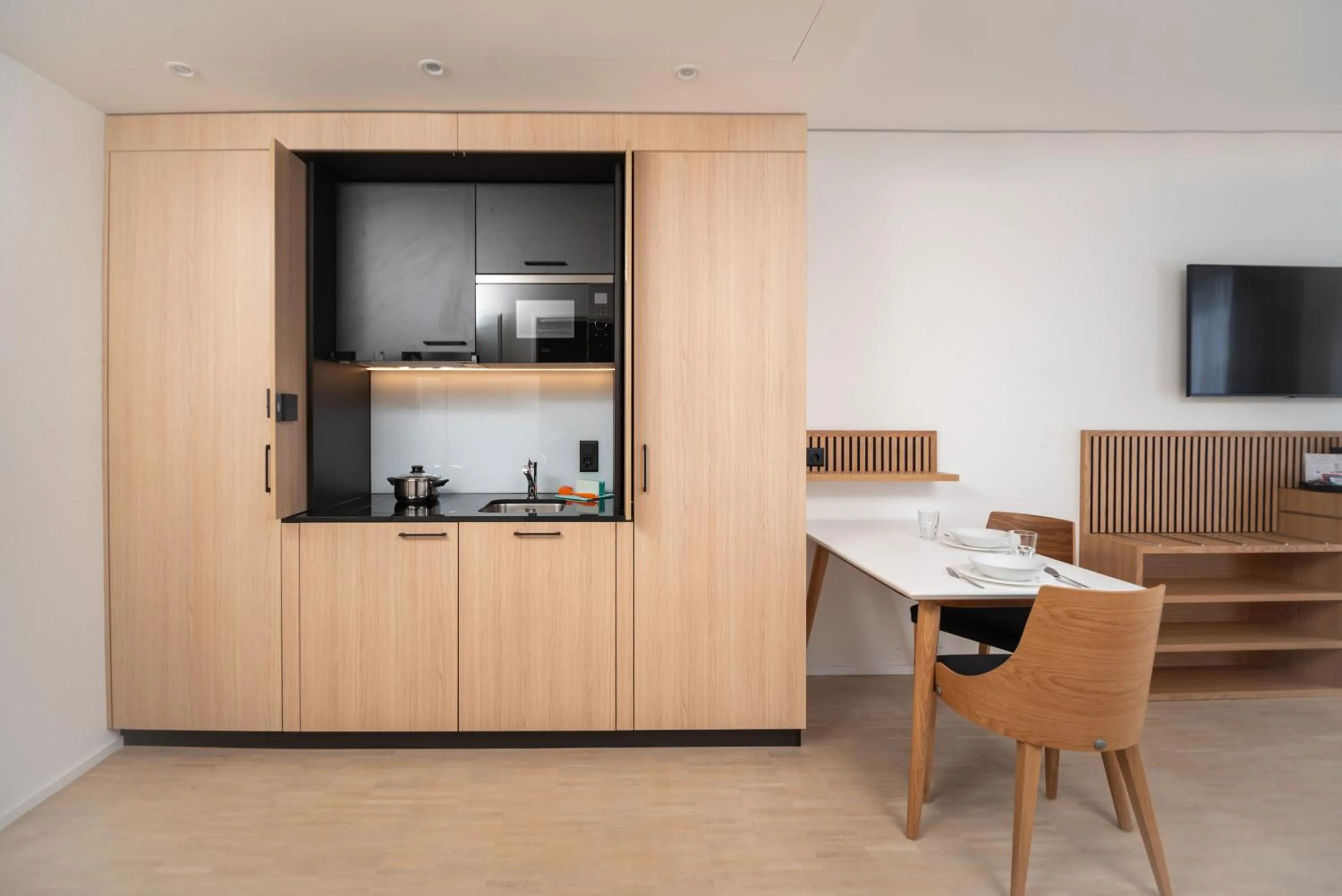 Kitchen or kitchenette in Tailormade Hotel BAB Bachenbülach