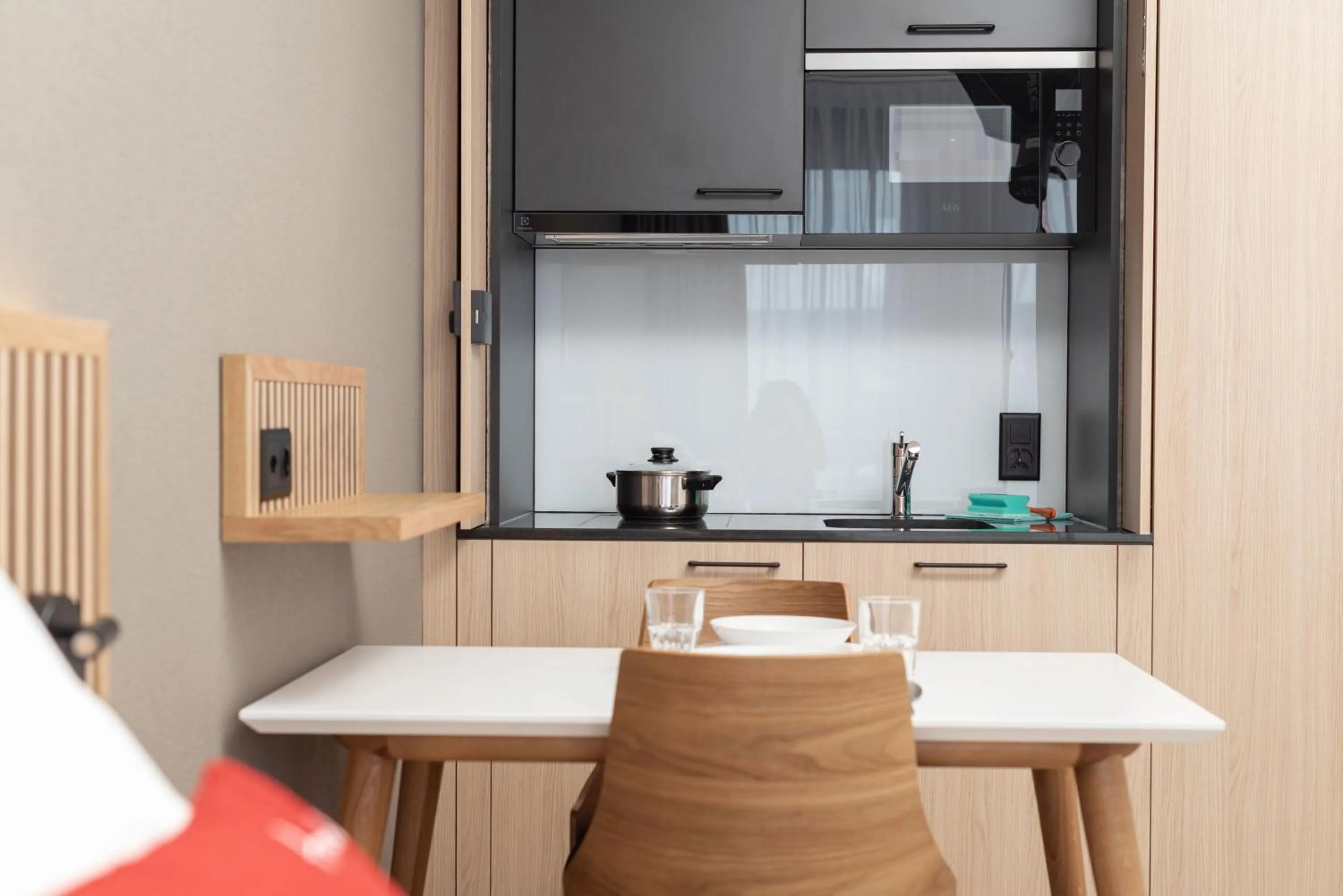 Kitchen or kitchenette in Tailormade Hotel BAB Bachenbülach