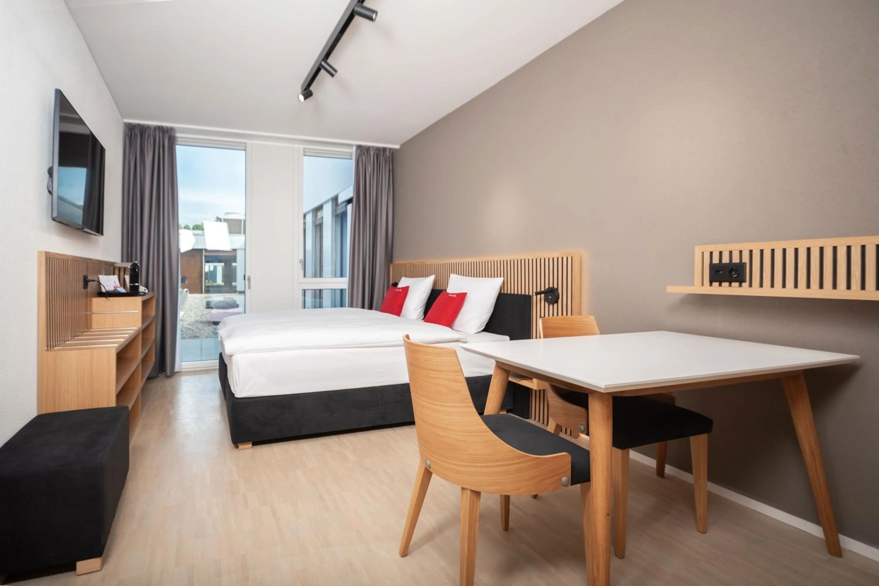 View (from property/room), Bed in Tailormade Hotel BAB Bachenbülach