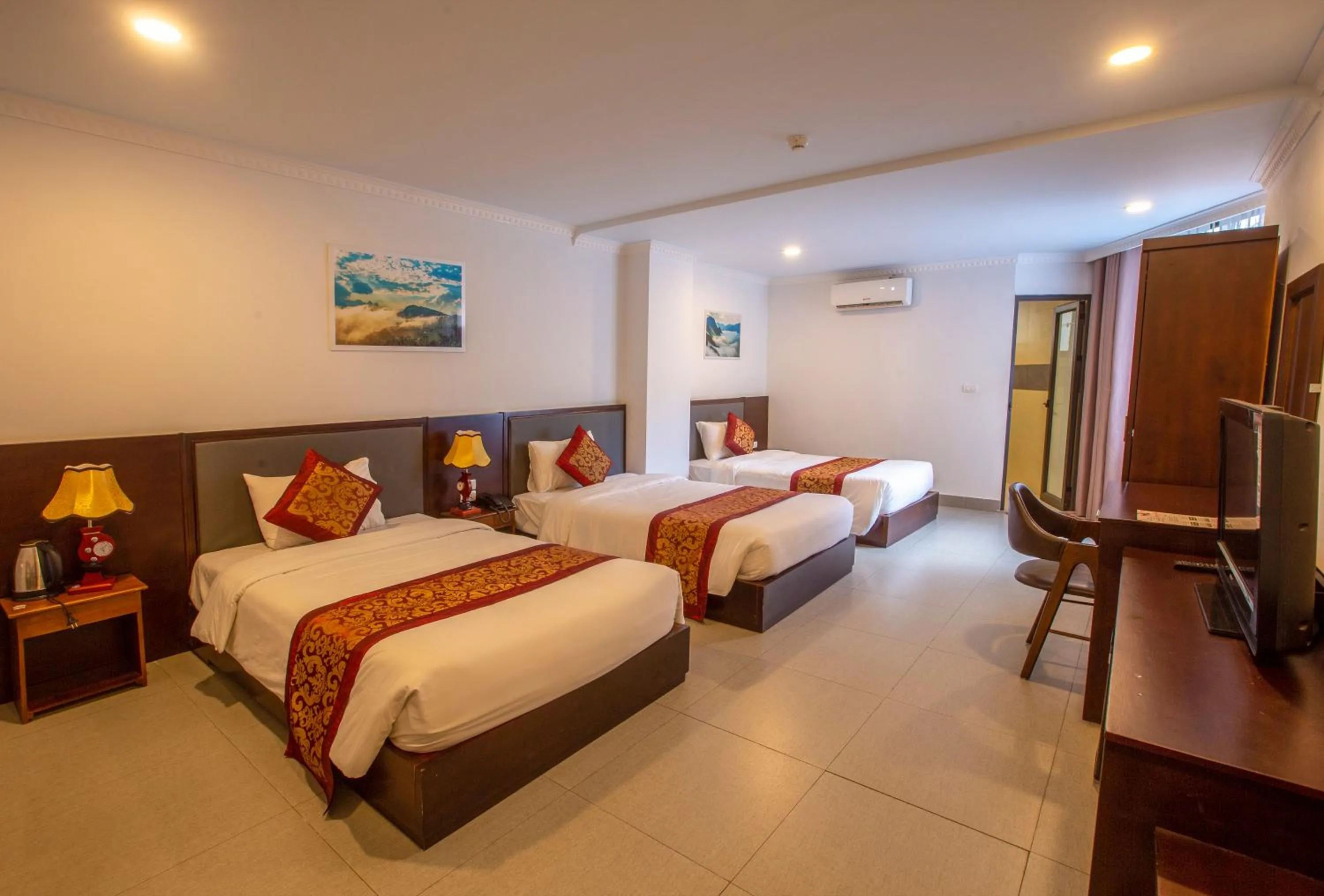 Bed in Grand Flamant Hotel Sapa