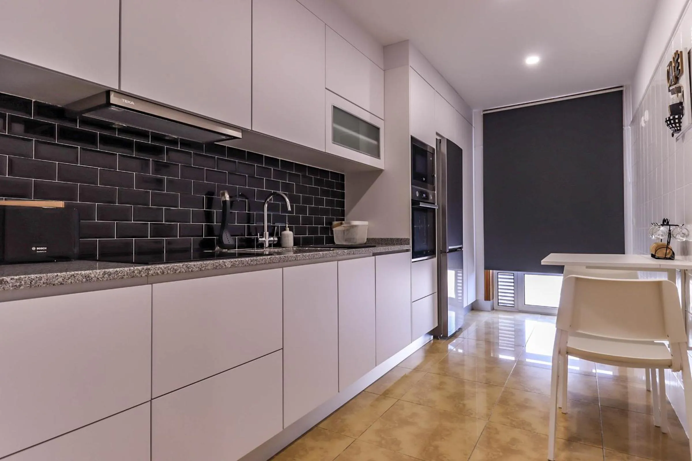 Kitchen or kitchenette in Flor do Mar - Spacious Apartment with Balcony