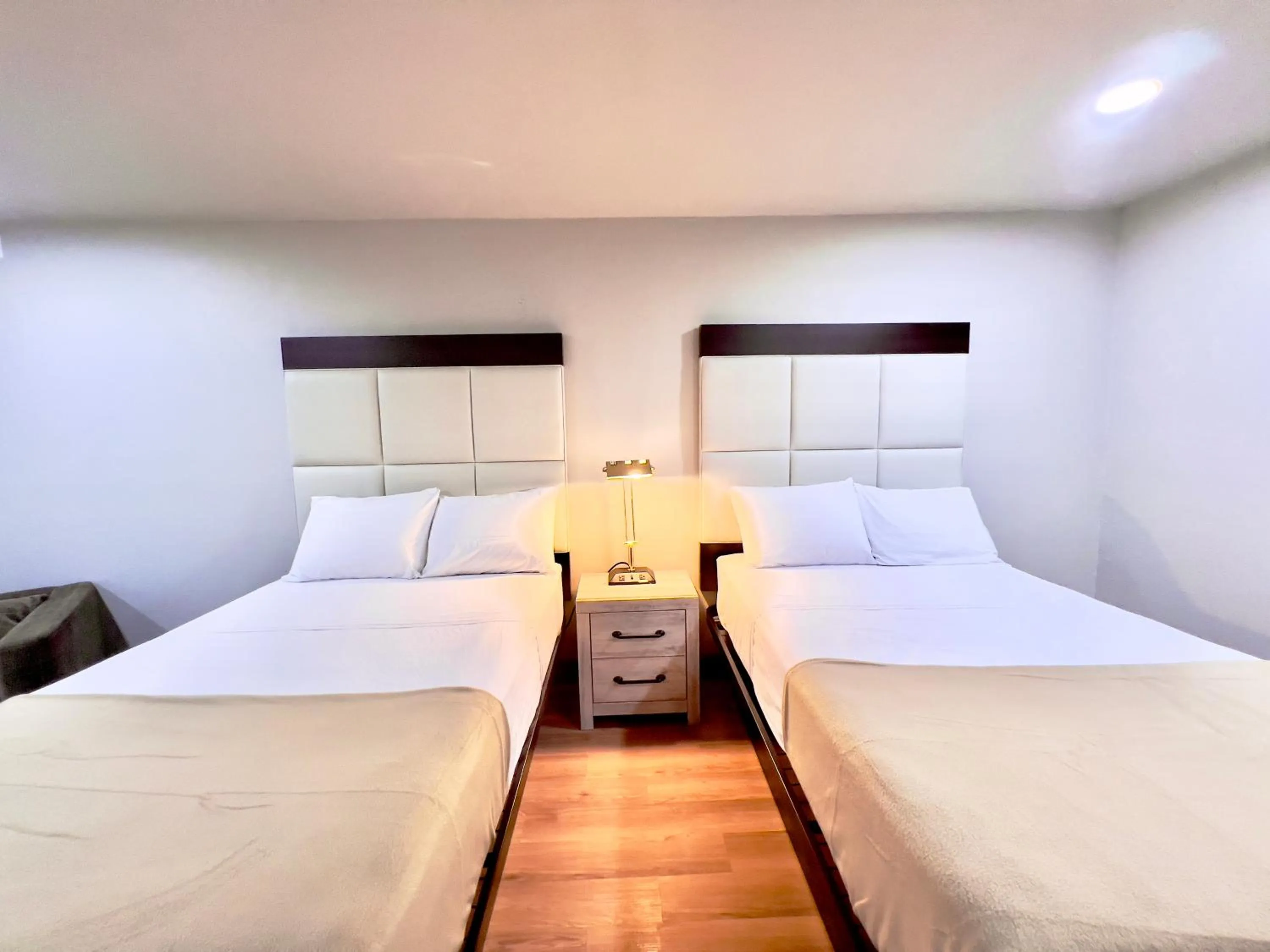 Bedroom, Bed in ECONOMY INN AND SUITES