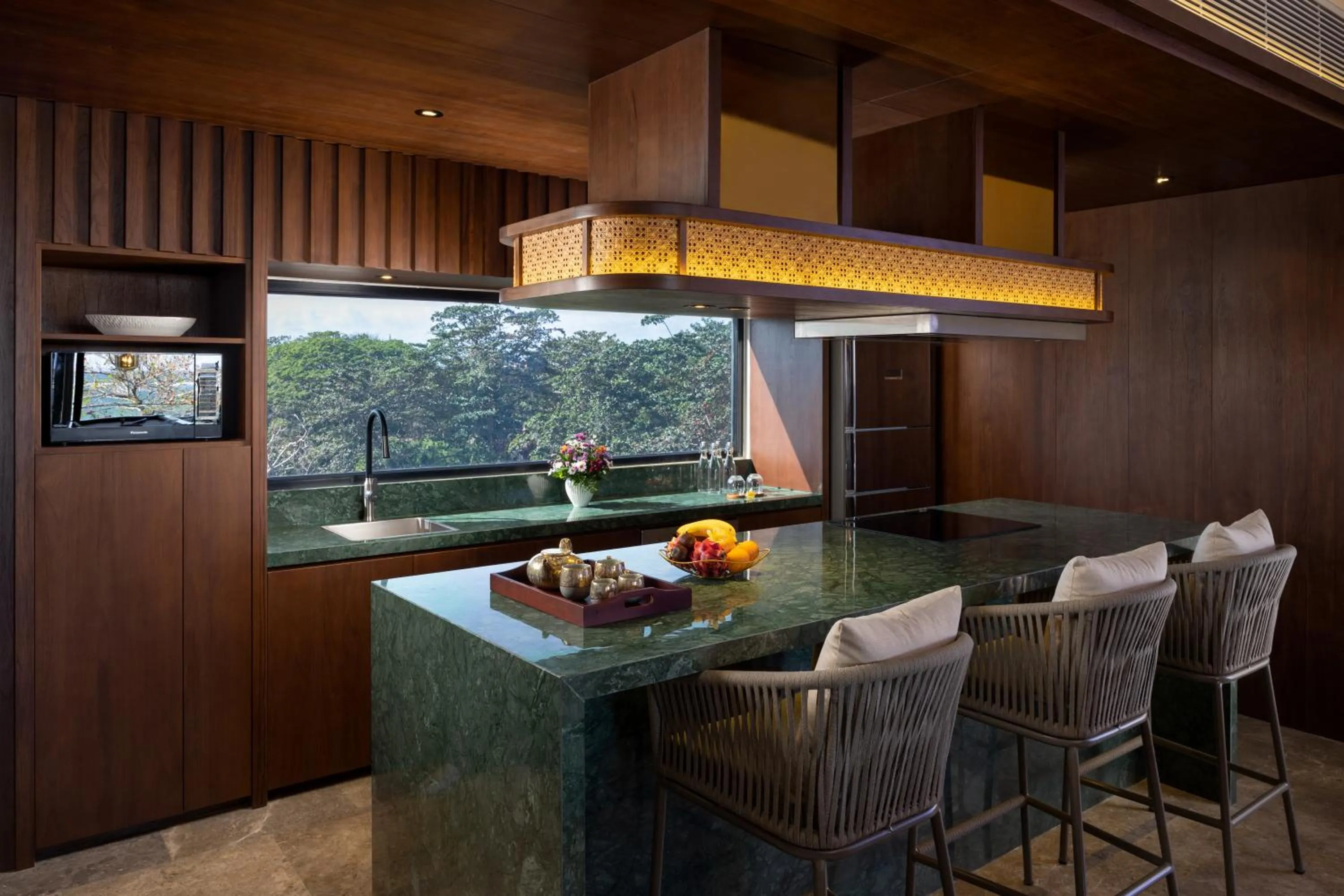 Kitchen or kitchenette in Sumitra Luxury Villas & Resort by Pramana