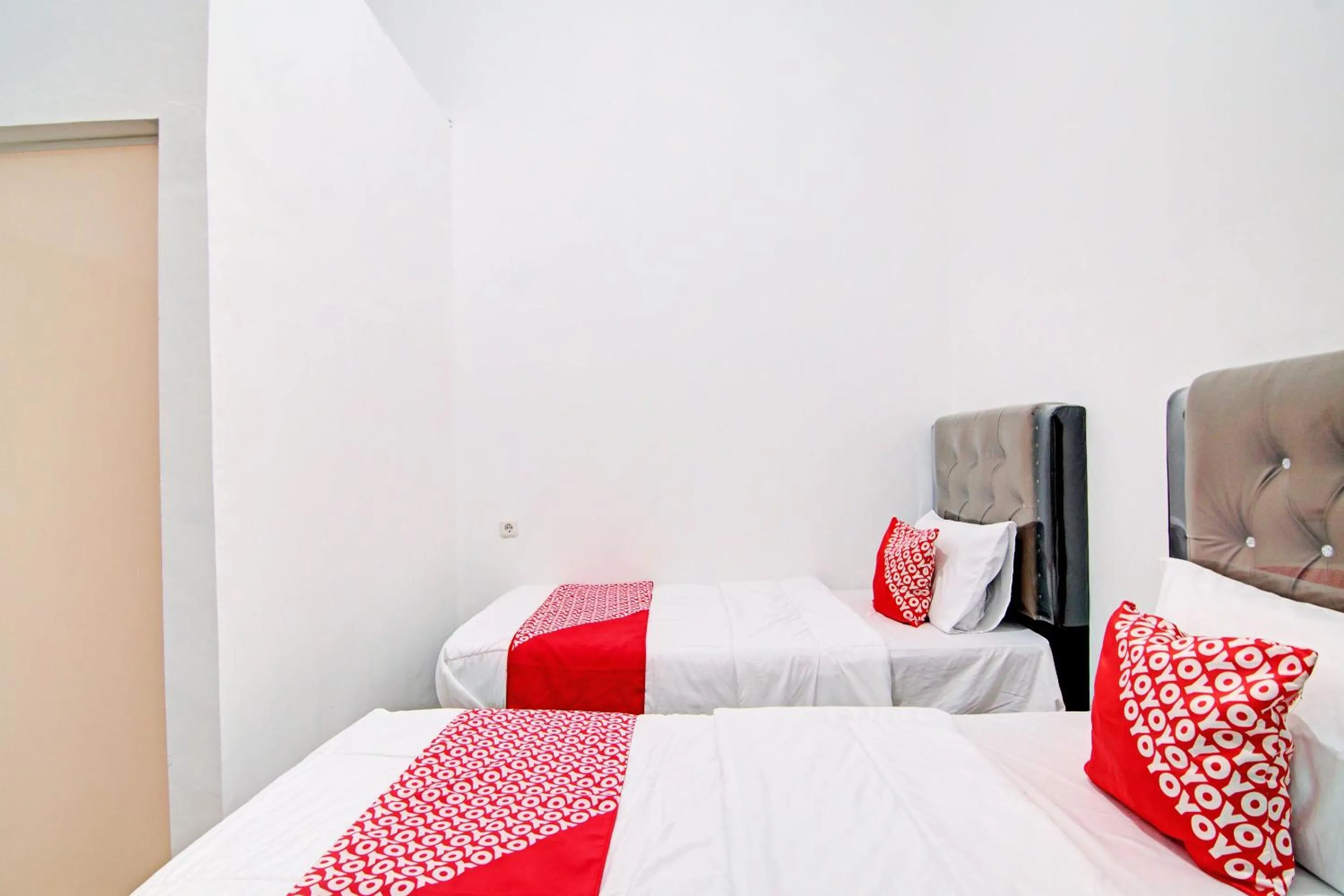 Bedroom in OYO 92946 Dekna Homestay Syariah
