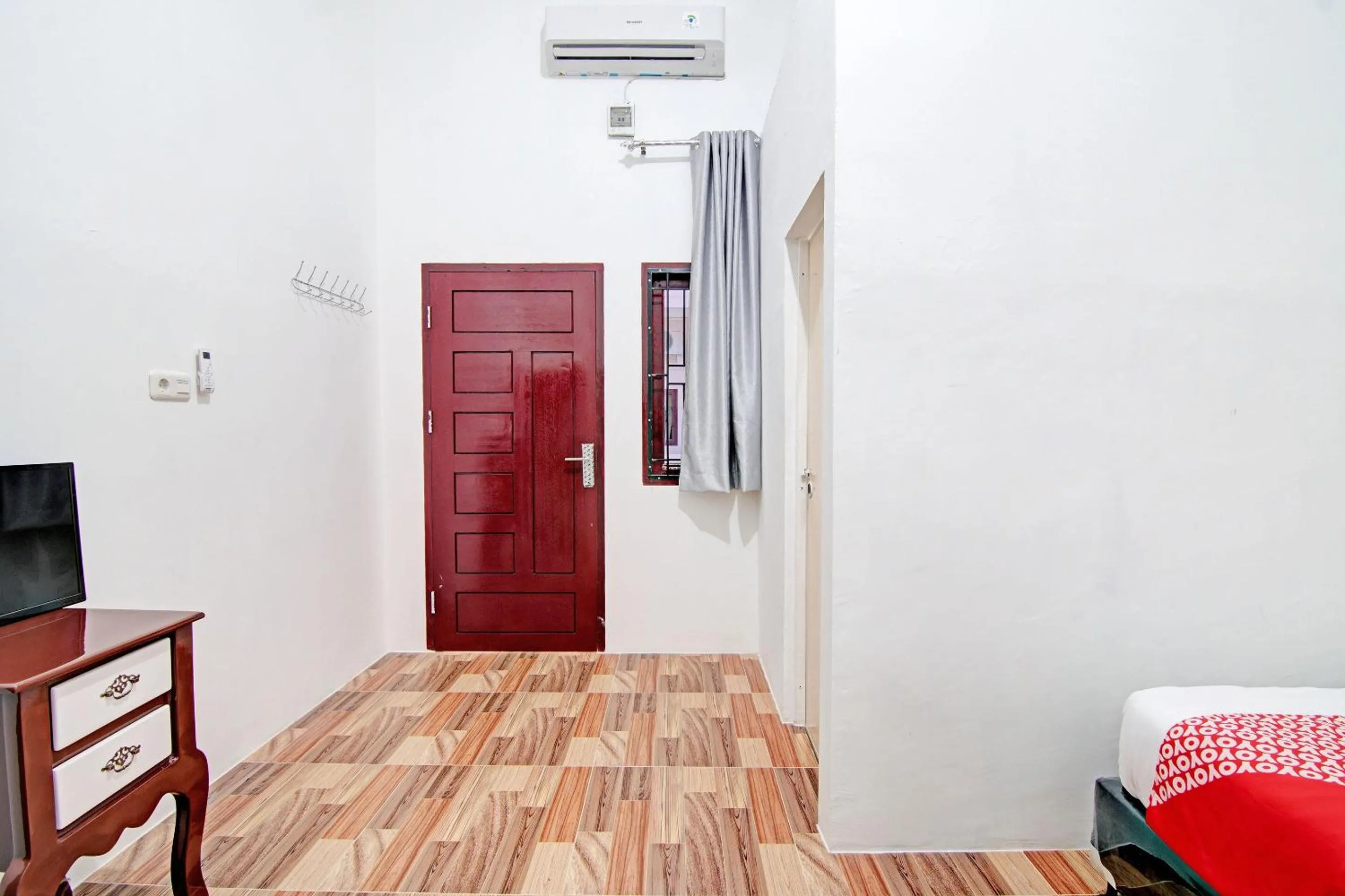 Bedroom in OYO 92946 Dekna Homestay Syariah