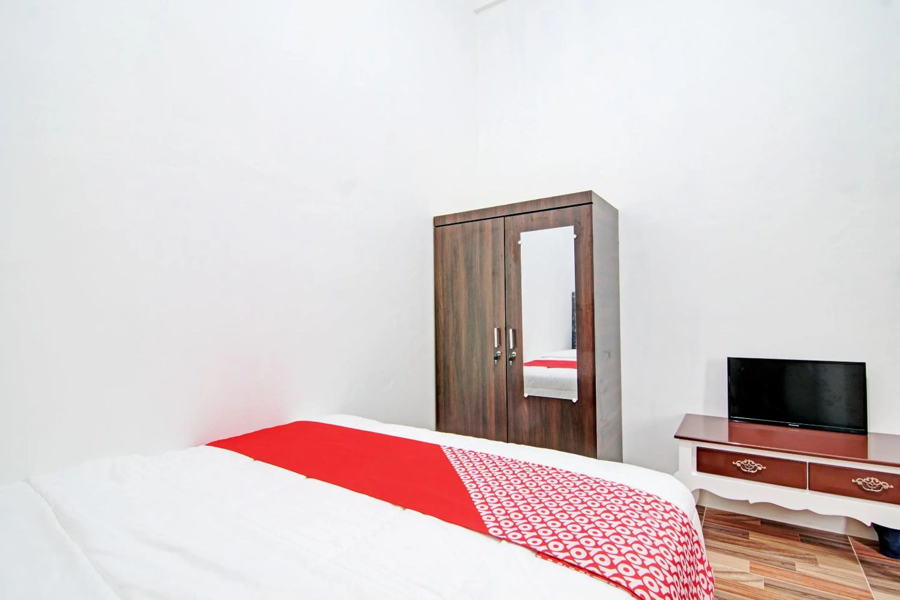 Bedroom in OYO 92946 Dekna Homestay Syariah