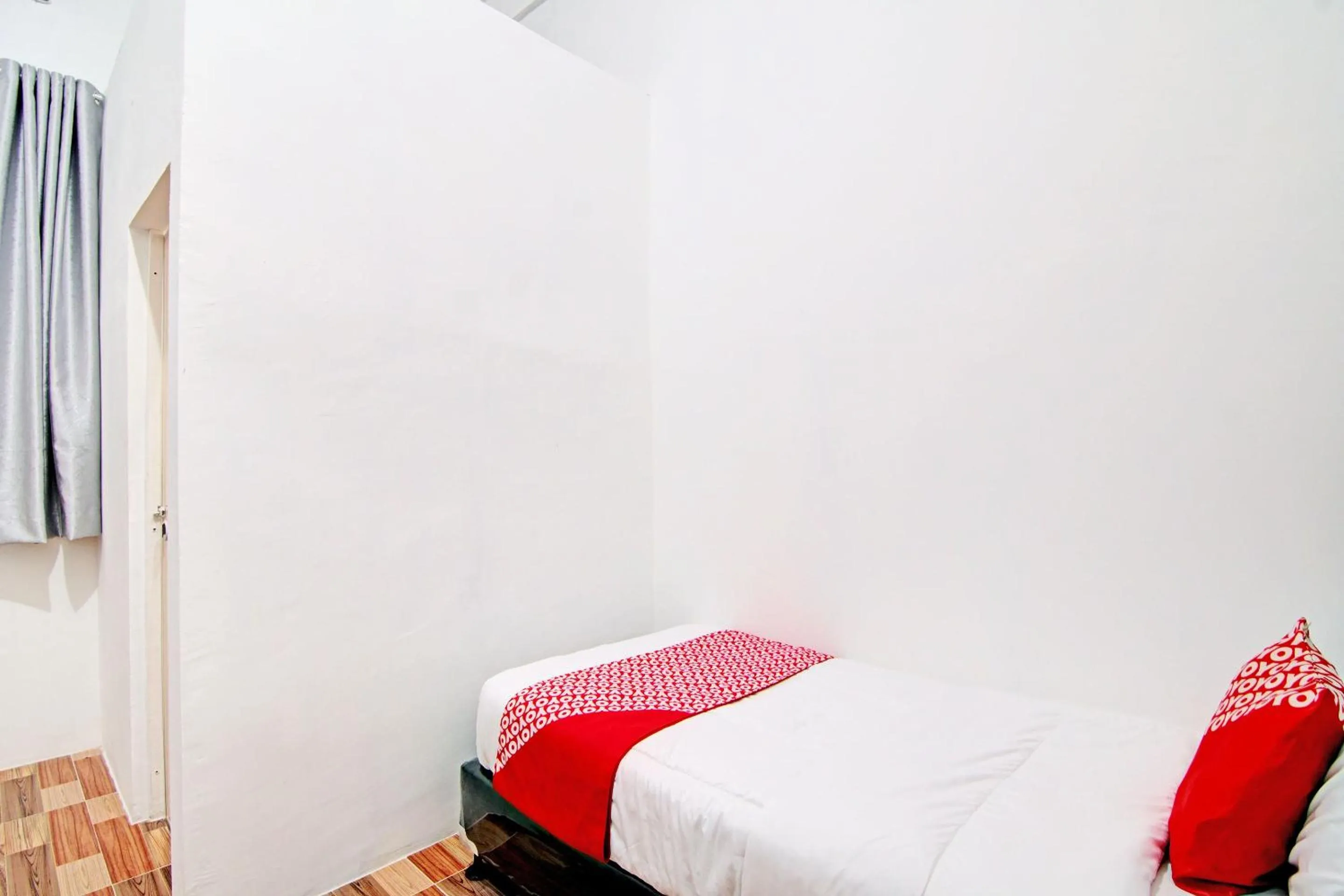Bedroom in OYO 92946 Dekna Homestay Syariah