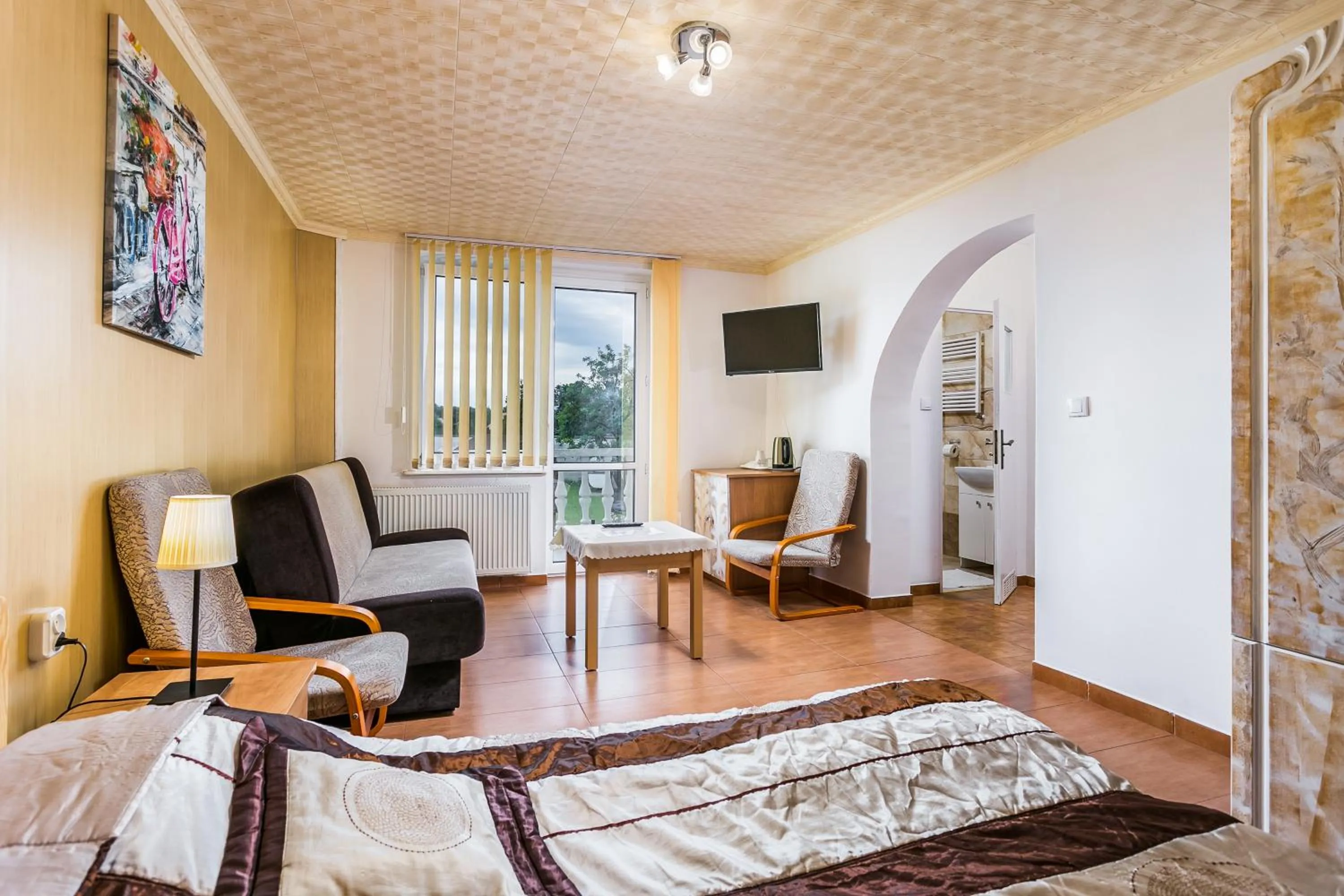 Seating area, Bed in Dom Gościnny Marcela