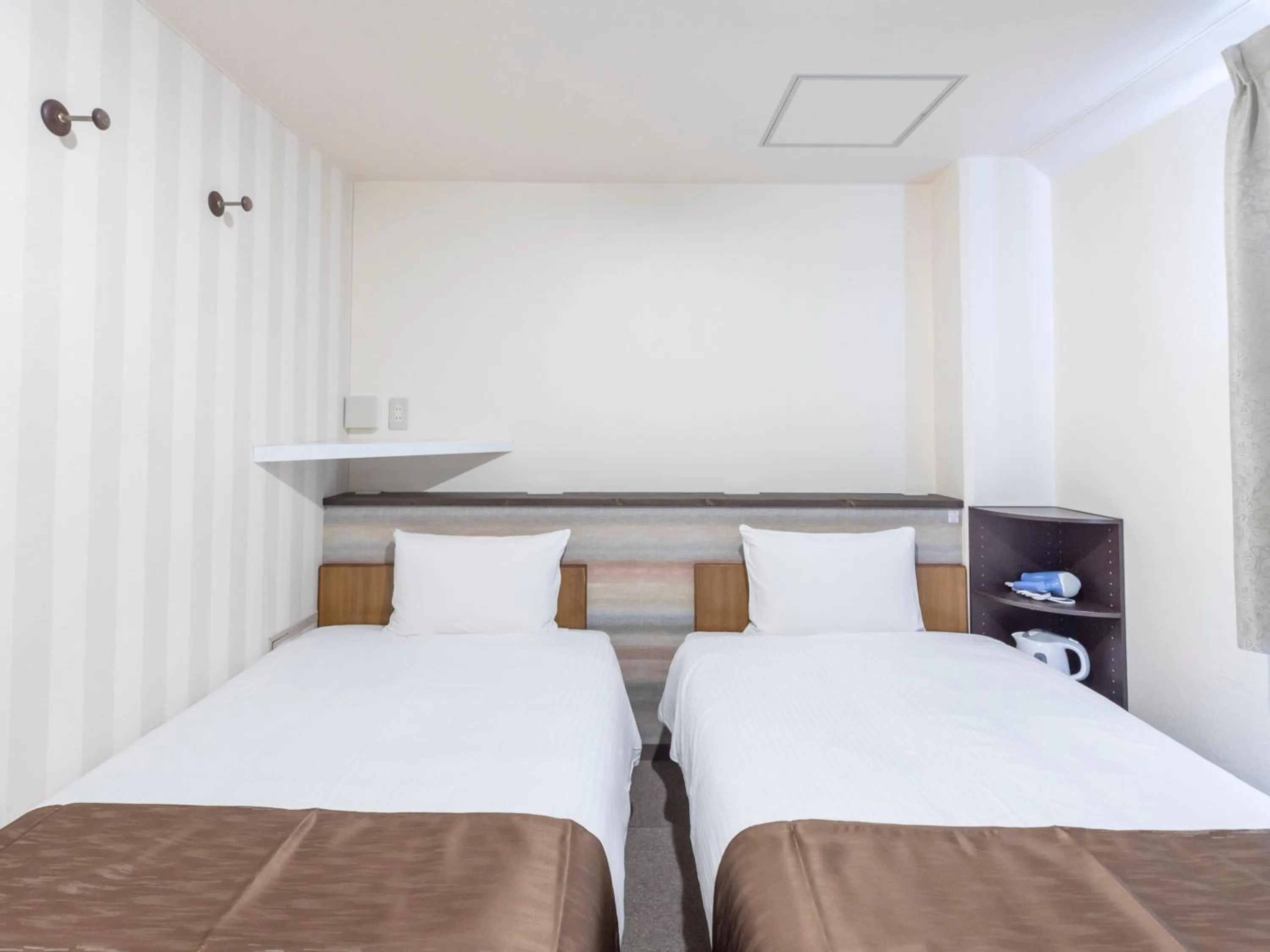 Photo of the whole room, Bed in Tabist New Gekkoen