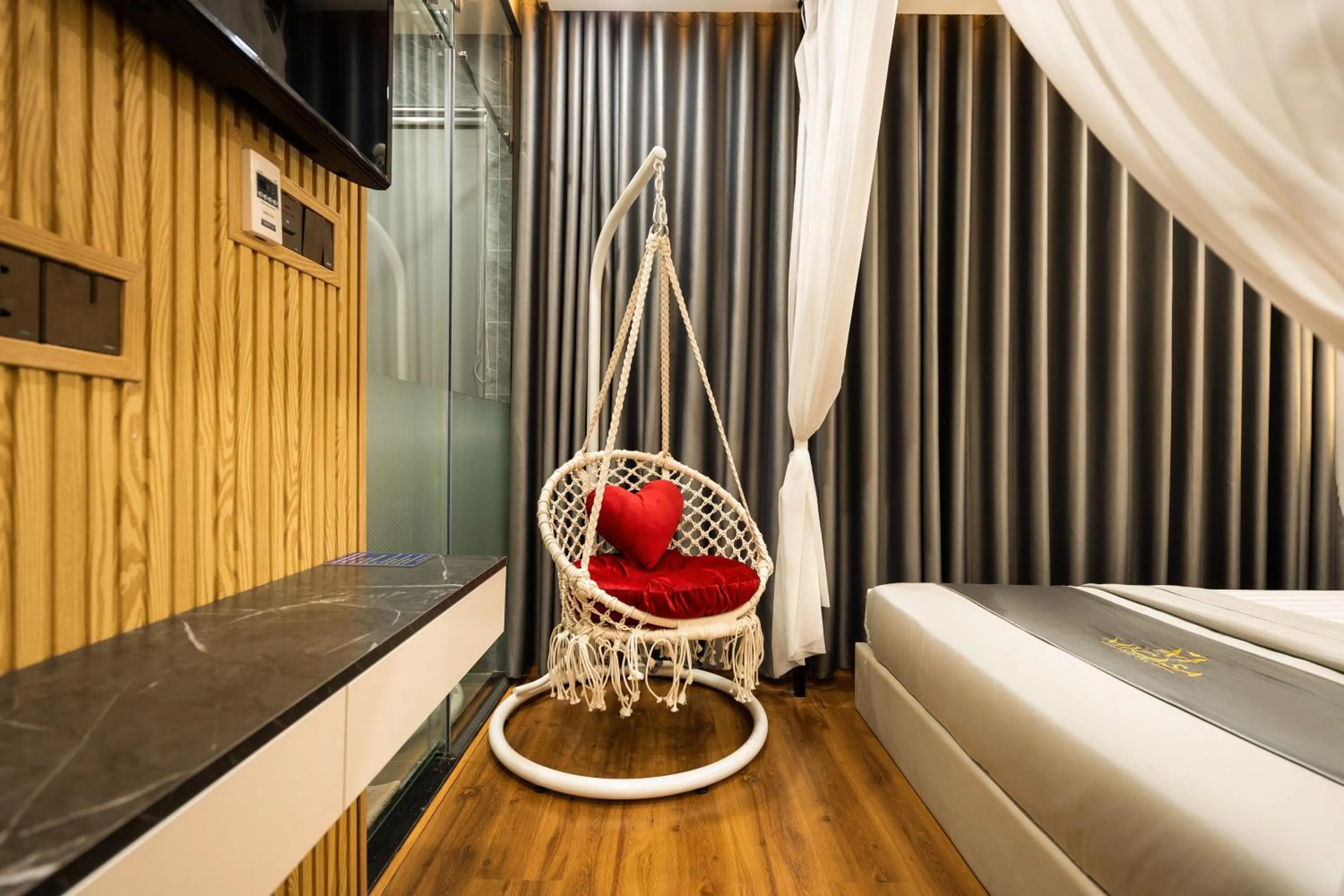 Seating area, Bed in MICASA HOTEL