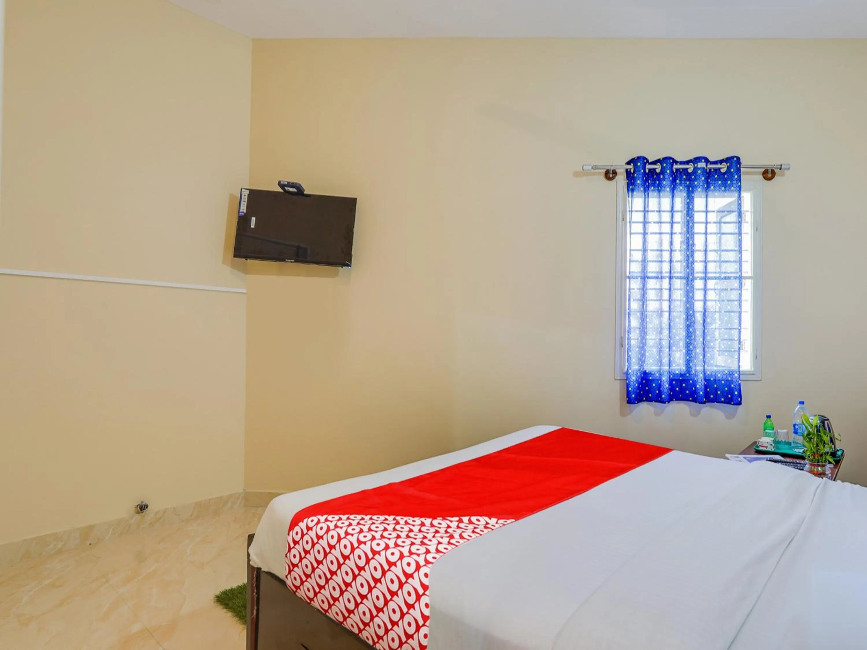 Bedroom in Hotel O SGR Residency