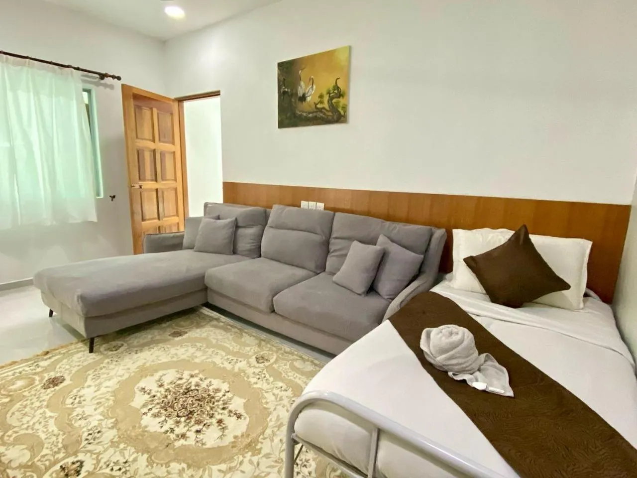 Living room, Bed in Chenang Inn