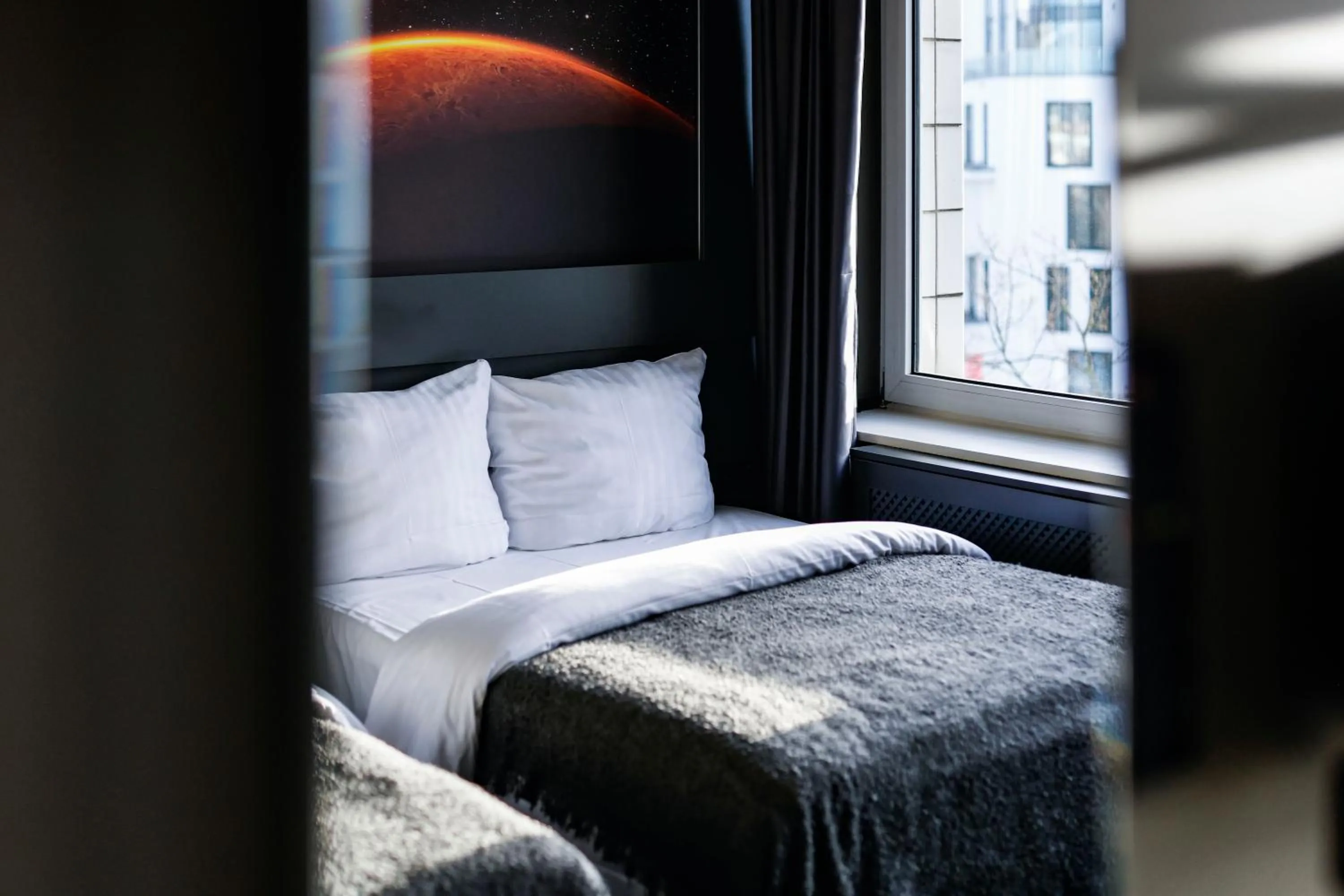 Bed in Sleephotels Cosmos