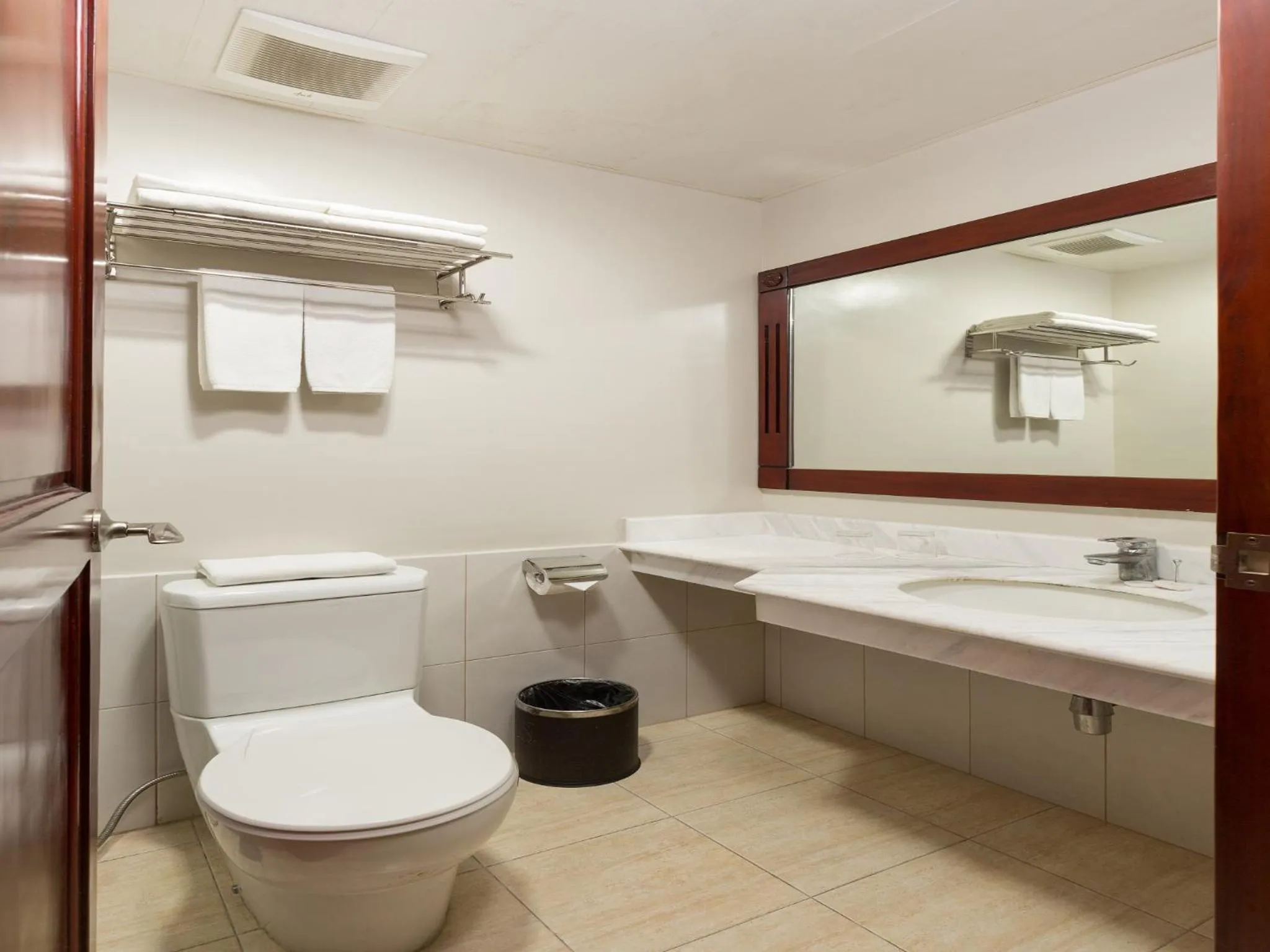 Bathroom in MJ Hotel and Suites