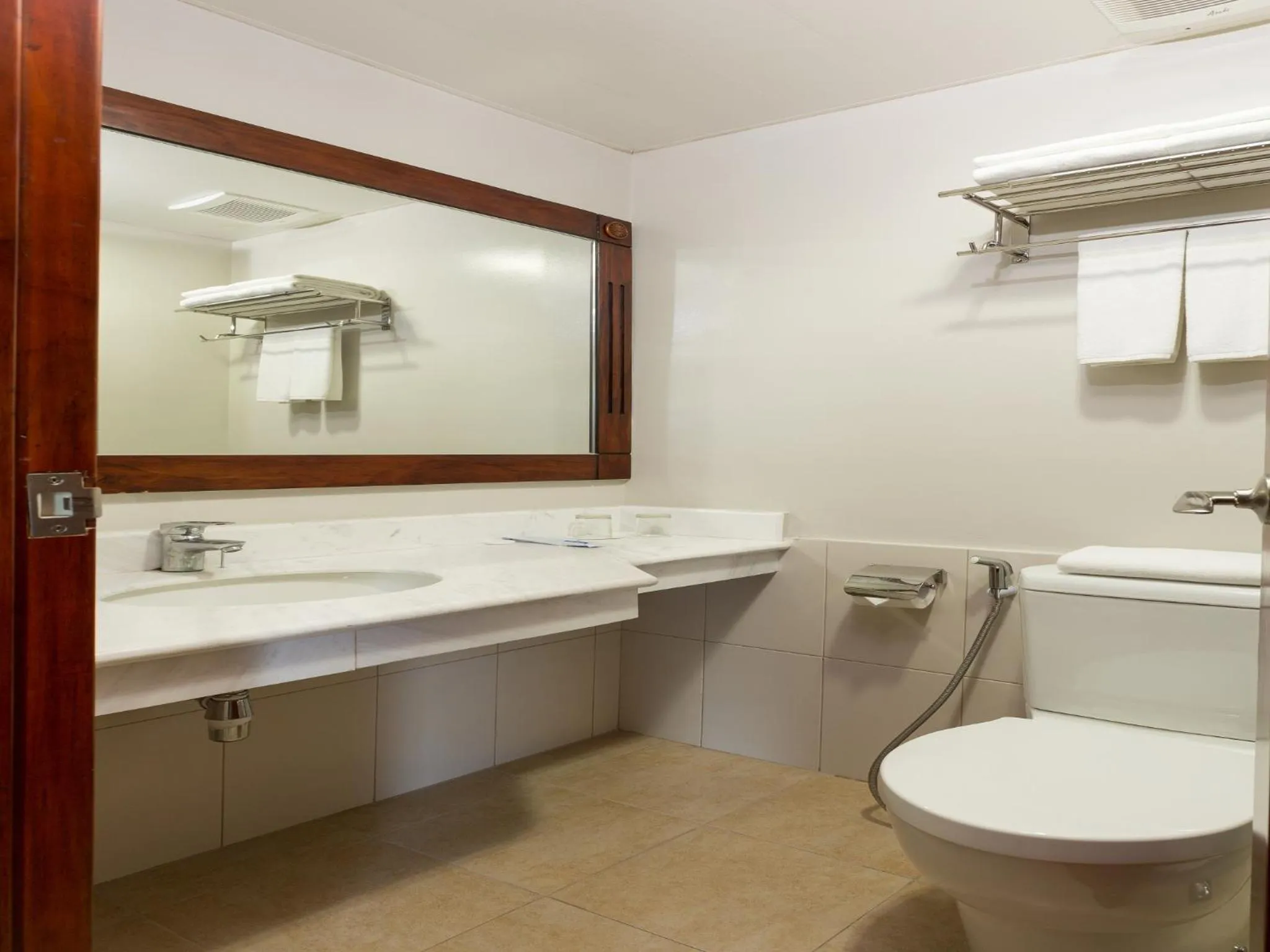 Bathroom in MJ Hotel and Suites