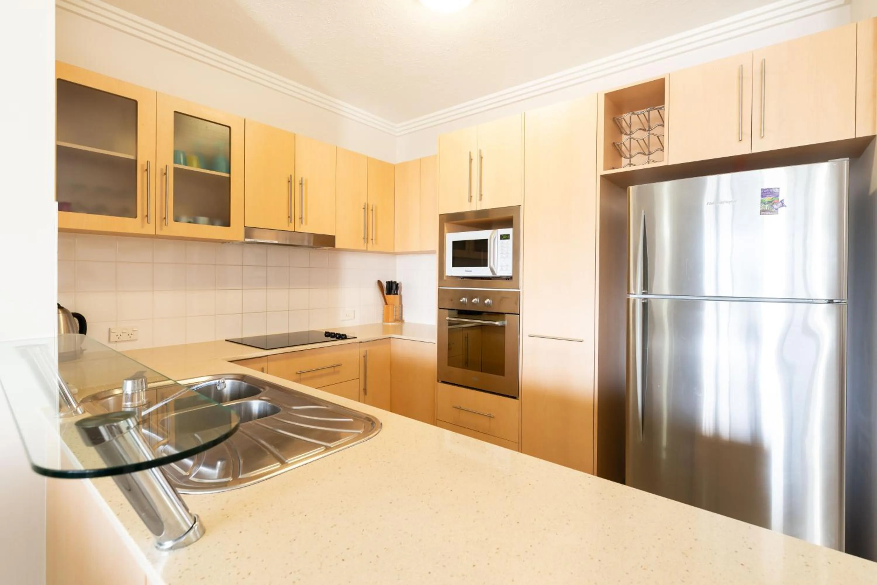 Kitchen or kitchenette in Cairns City Apartments