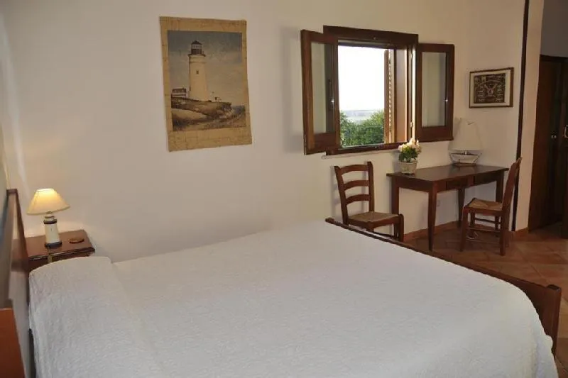 Bed in Punto de Vista B&B Makari