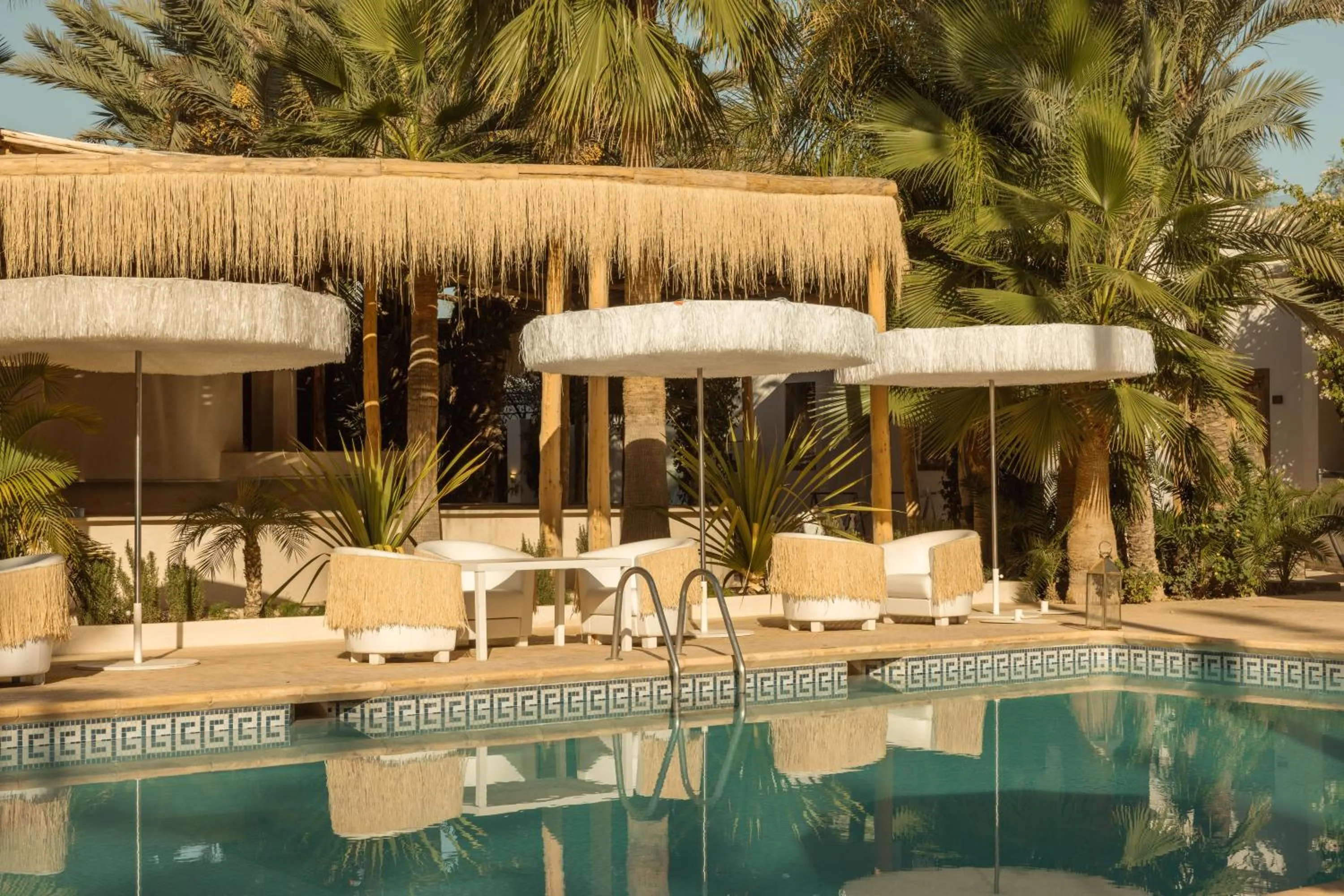 Swimming pool in Les Palmiers Boutique Hôtel & Spa