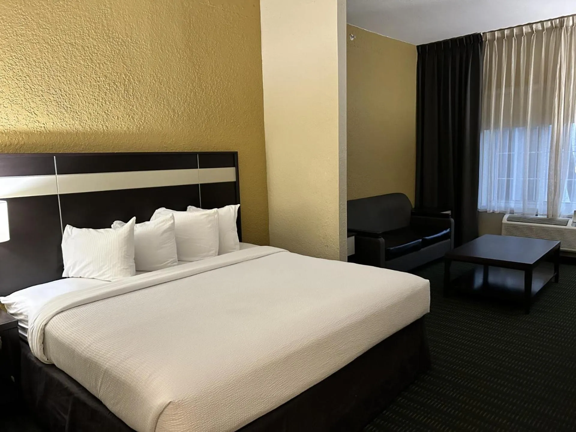 Bed in SureStay Plus Hotel by Best Western Vero Beach