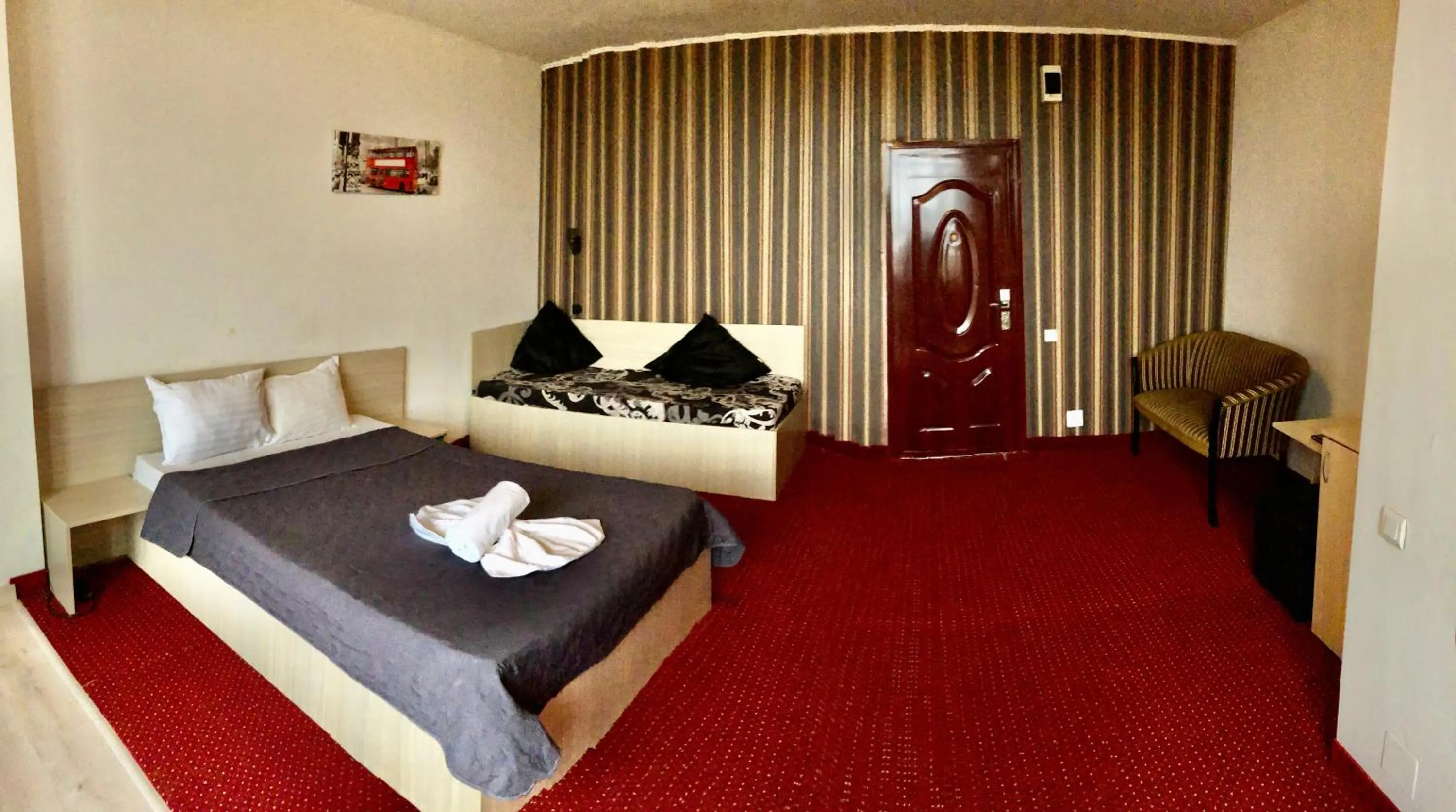 Bed in Hotel Mon Caprice