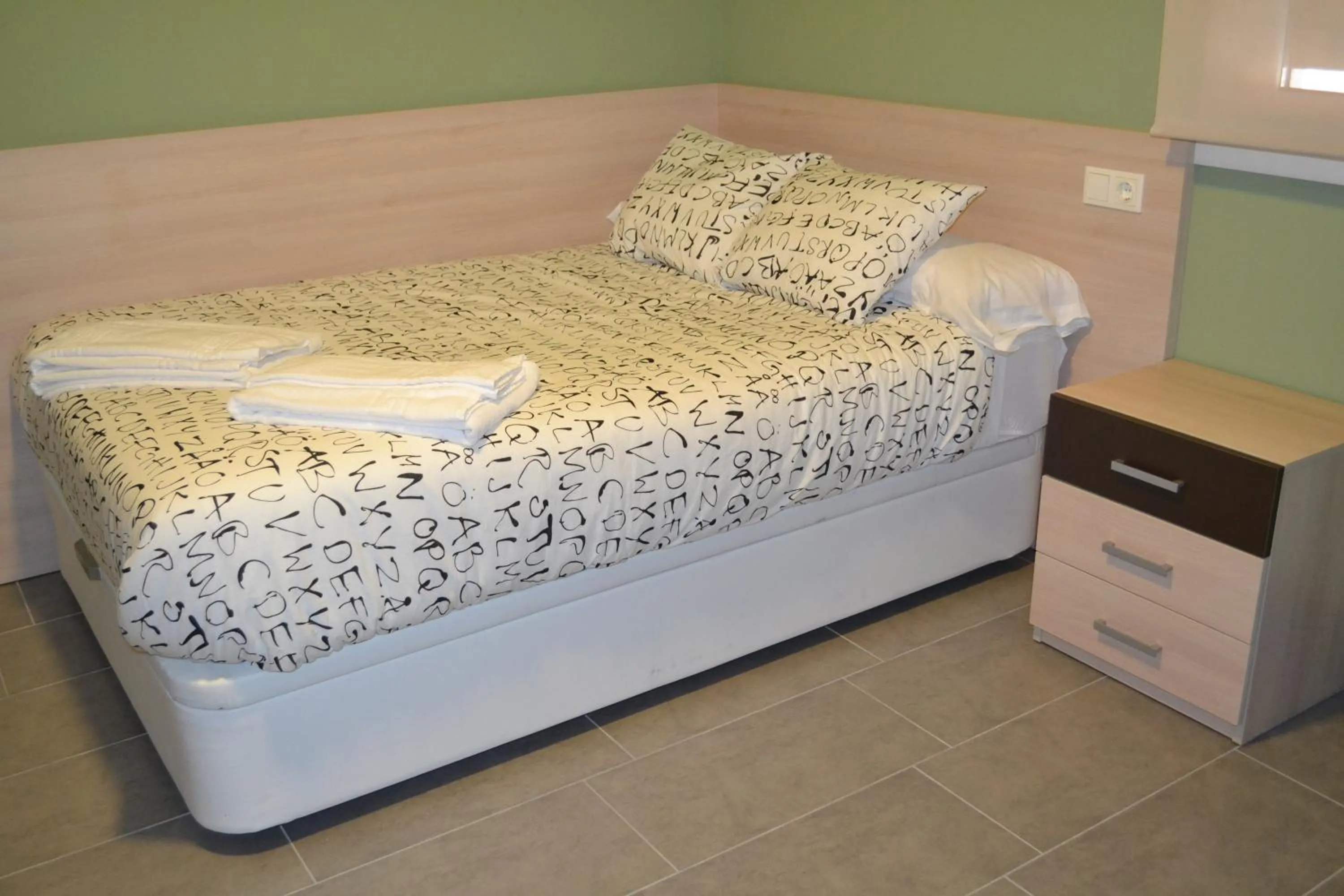 Bed in The Factory Residence Hall