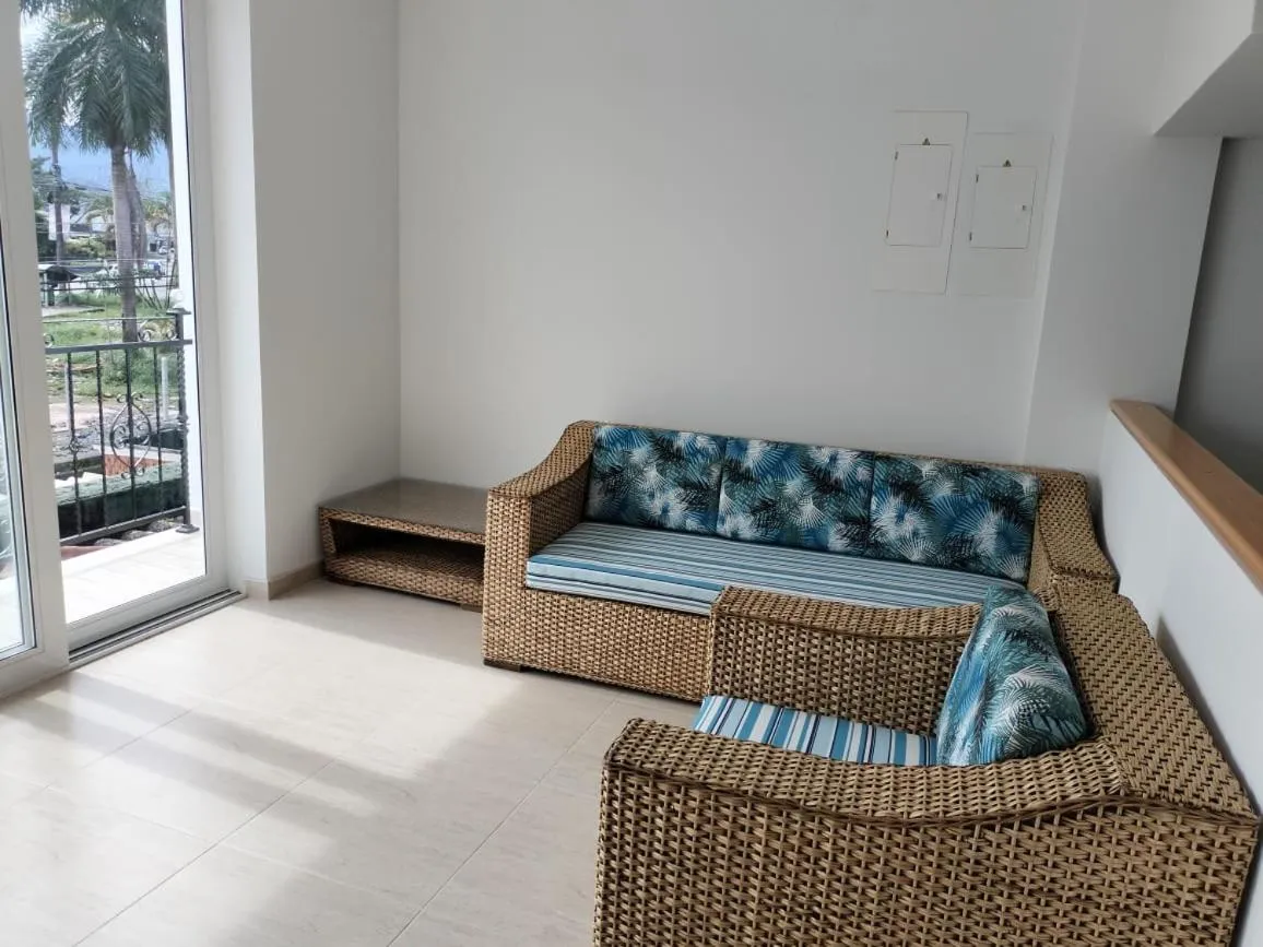 Living room in Hotel Guadalupe Acacías