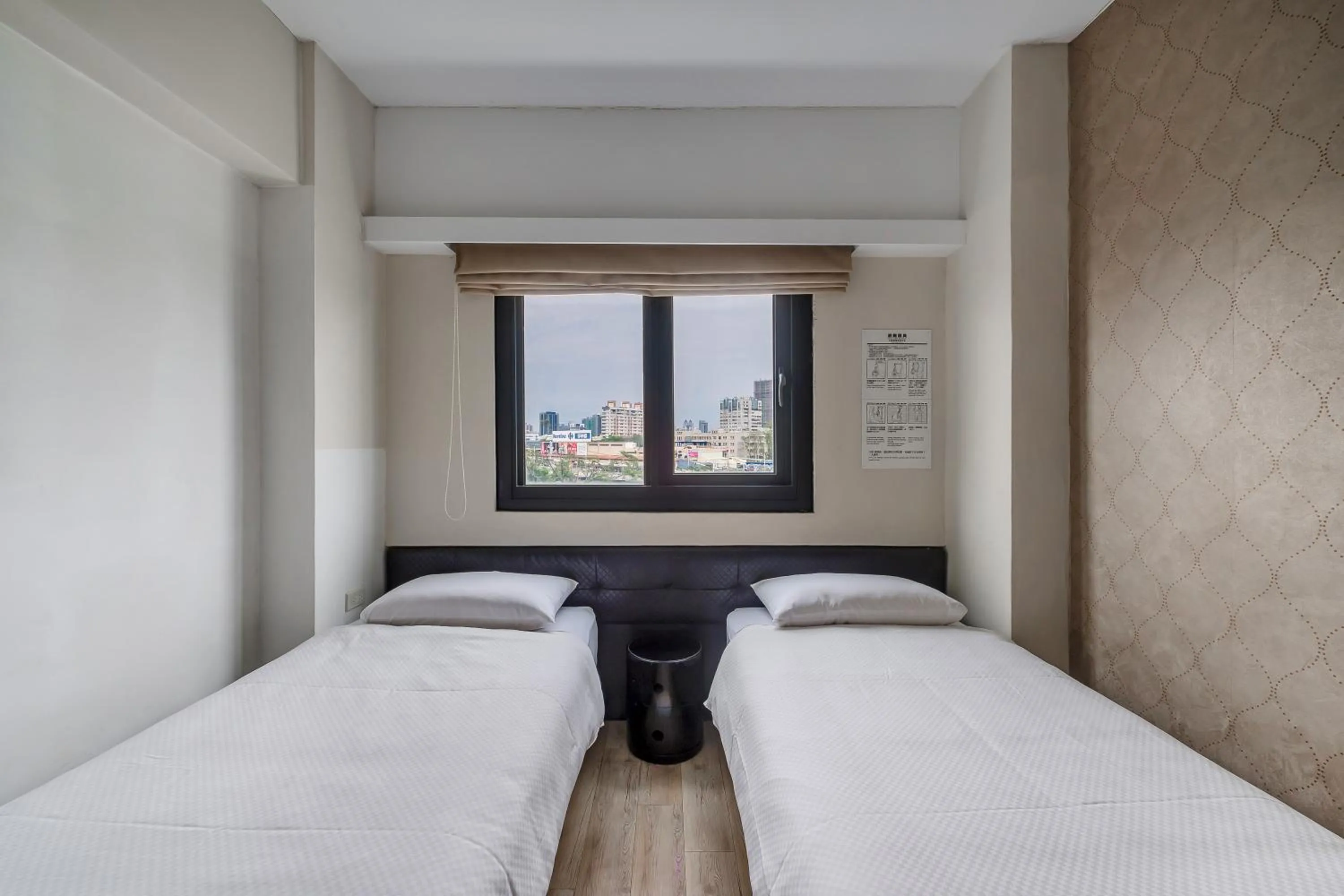 Bed in CHECK inn Express Kaohsiung Love River