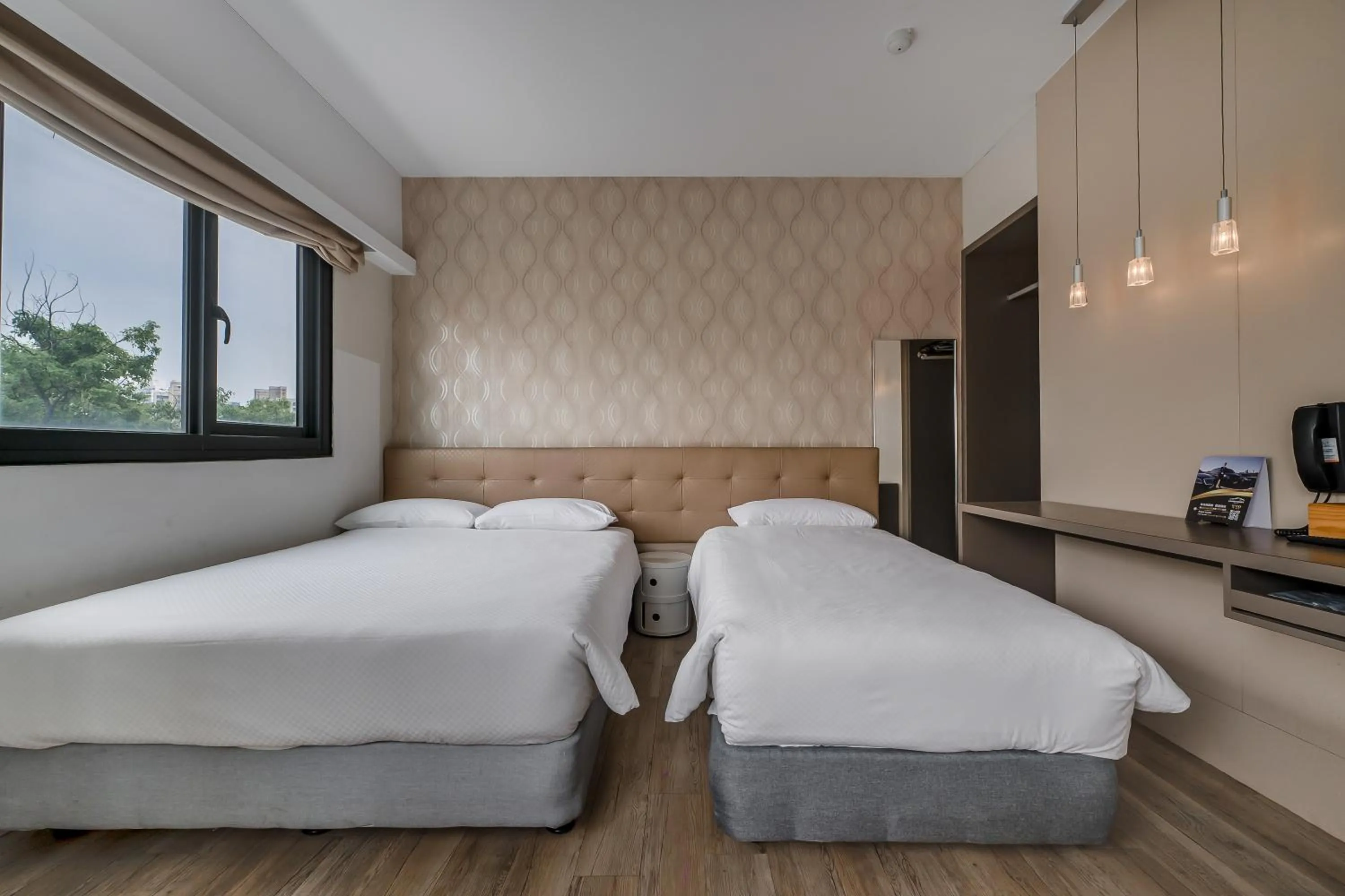 Bed in CHECK inn Express Kaohsiung Love River