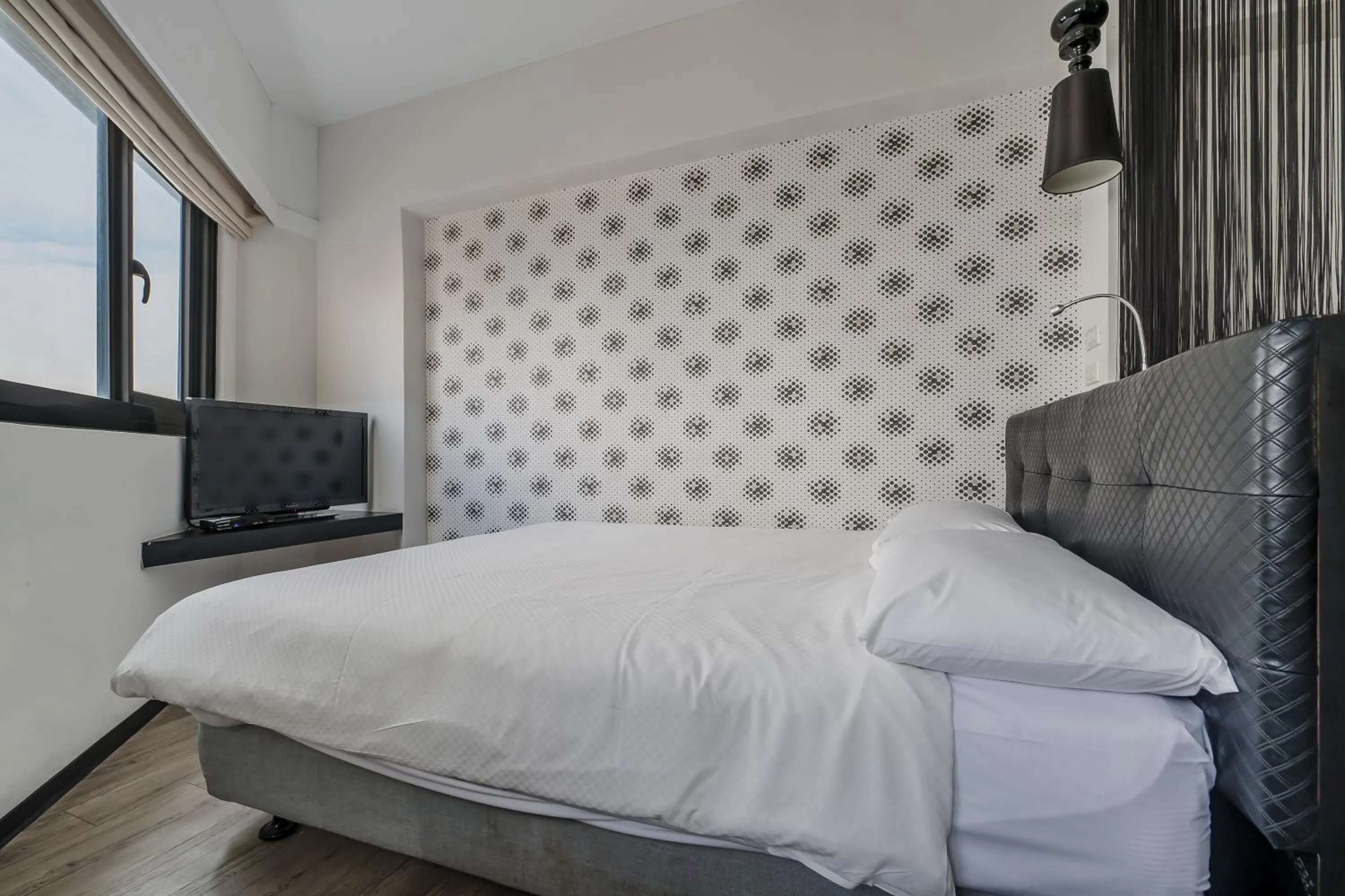 Bed in CHECK inn Express Kaohsiung Love River