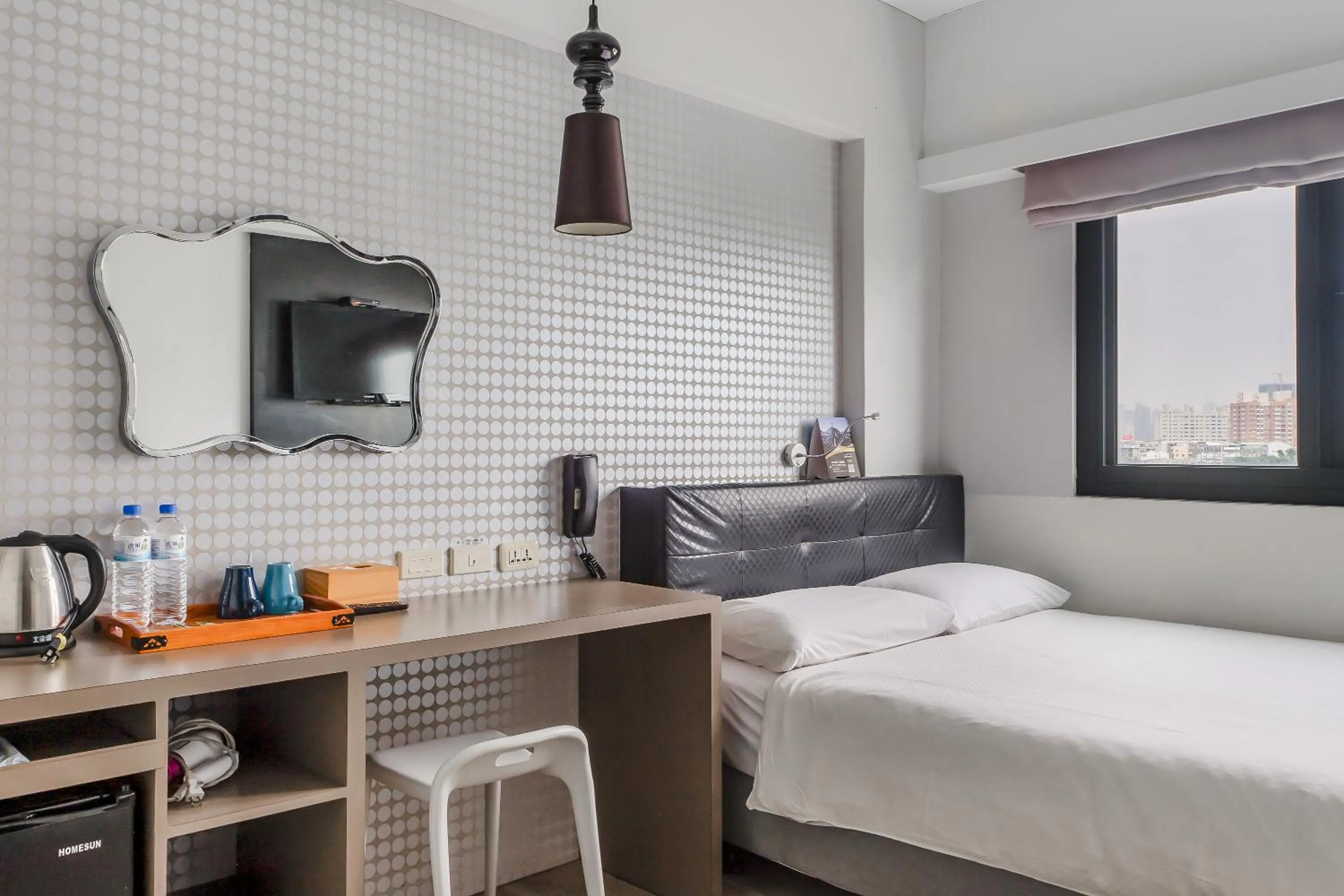 Bed in CHECK inn Express Kaohsiung Love River